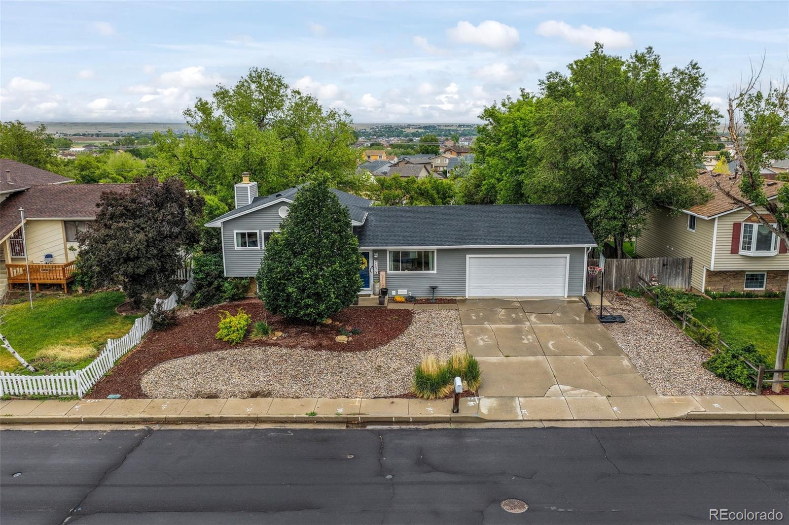  Colorado Springs Home | MLS #: 65002047175  Woody Creek Drive, Colorado Springs Beds: 4 Baths: 2 Price: $375,000