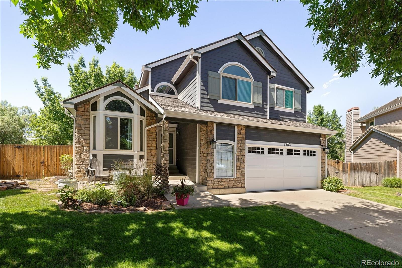  Arvada Home | MLS #: 38008226863  Swadley Court, Arvada Beds: 5 Baths: 4 Price: $875,000