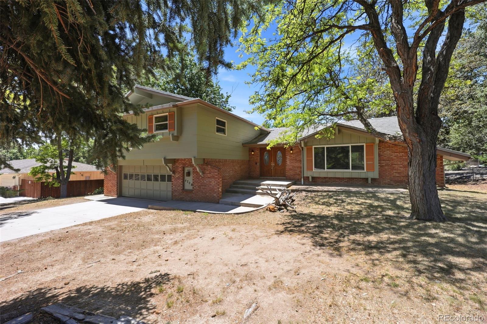 Vista Hills Colorado Springs Home | MLS #: 87217074708  Vista View Lane, Colorado Springs Beds: 6 Baths: 4 Price: $410,000