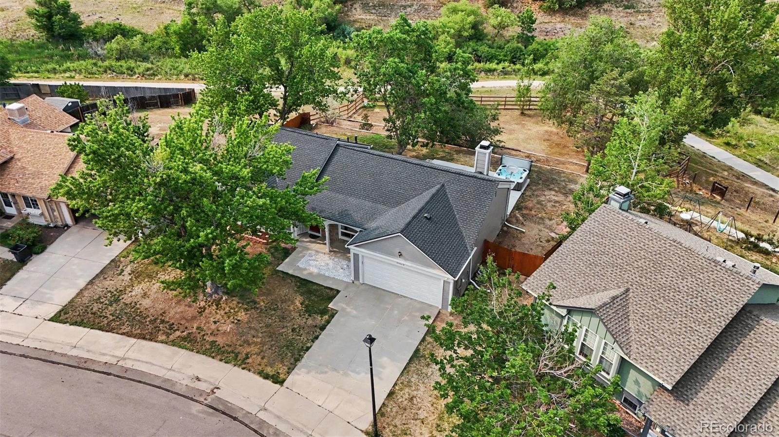  Aurora Home | MLS #: 803540821623 E Powers Circle, Aurora Beds: 4 Baths: 3 Price: $569,000