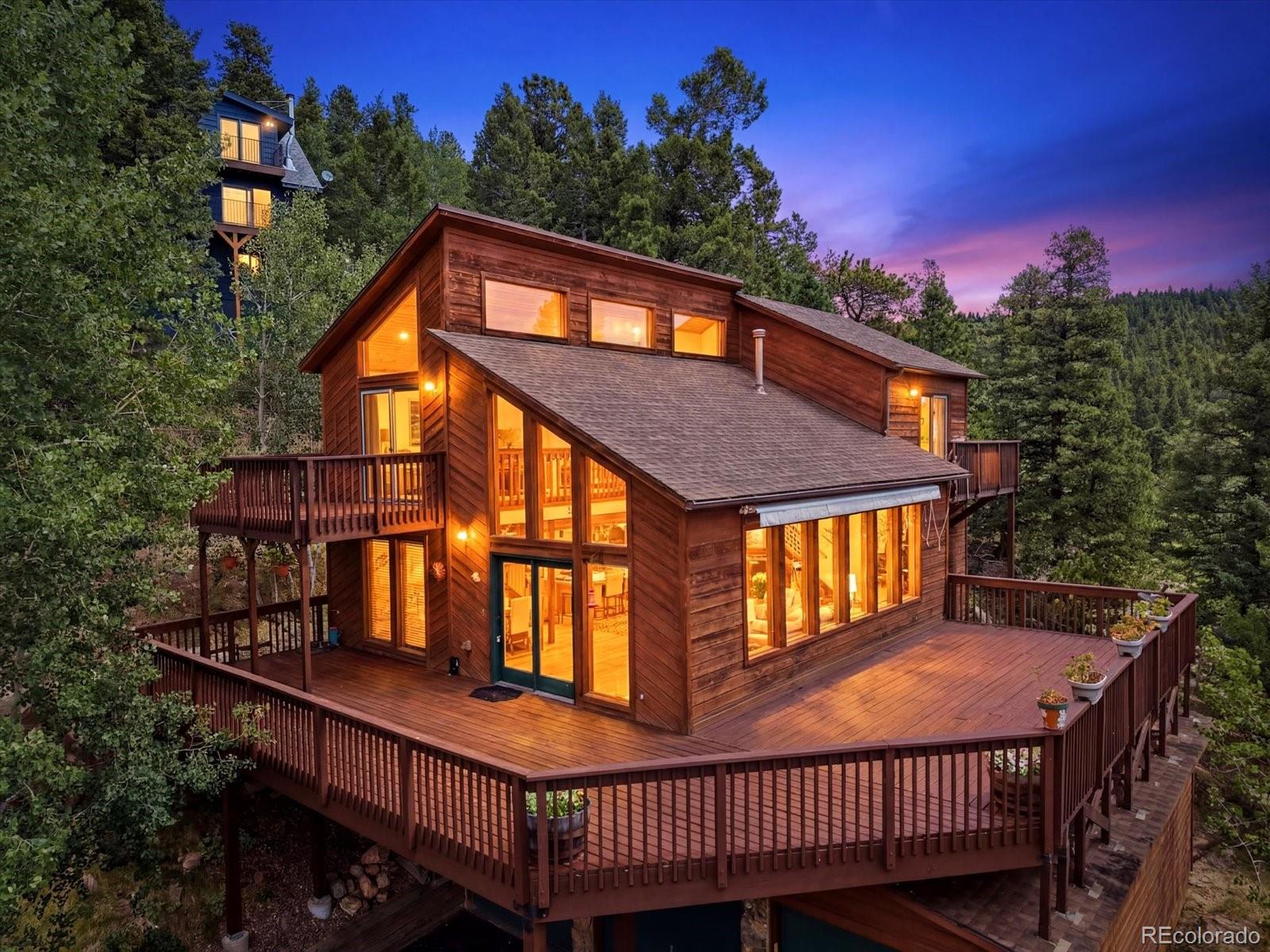Kings Valley Custom Conifer Home | MLS #: 909461111743  Braun Way, Conifer Beds: 3 Baths: 3 Price: $785,000