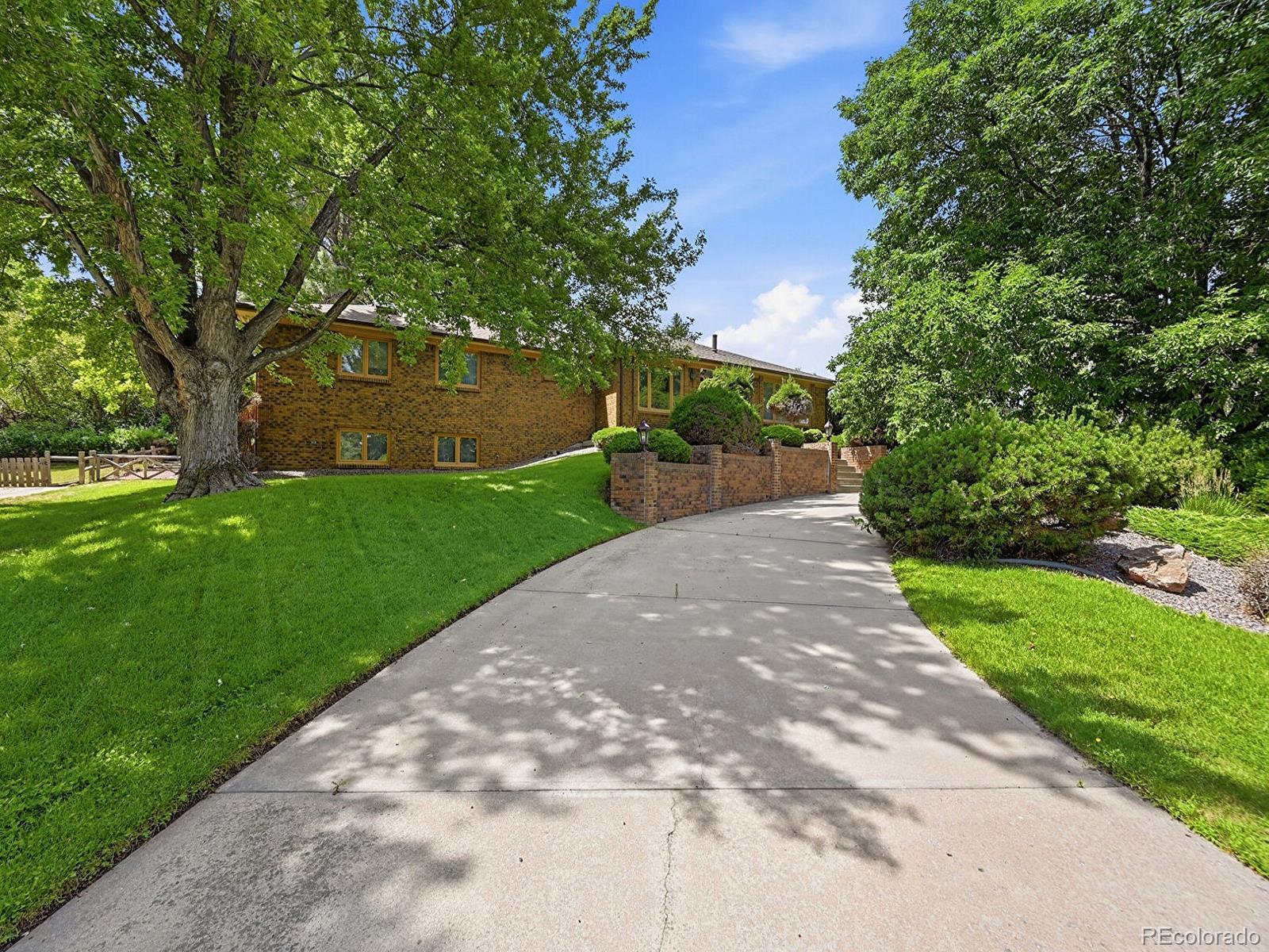 Columbine Littleton Home | MLS #: 909796330  Dutch Creek Drive, Littleton Beds: 4 Baths: 4 Price: $1,300,000