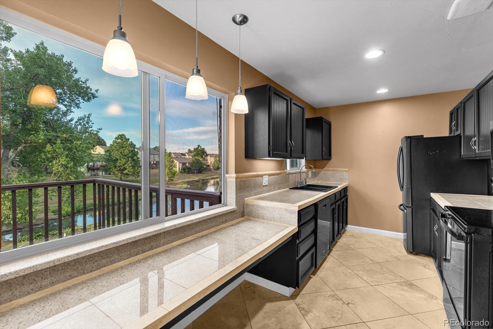 Columbine Littleton Home | MLS #: 47597624663 W Ponds Circle, Littleton Beds: 4 Baths: 3 Price: $449,000