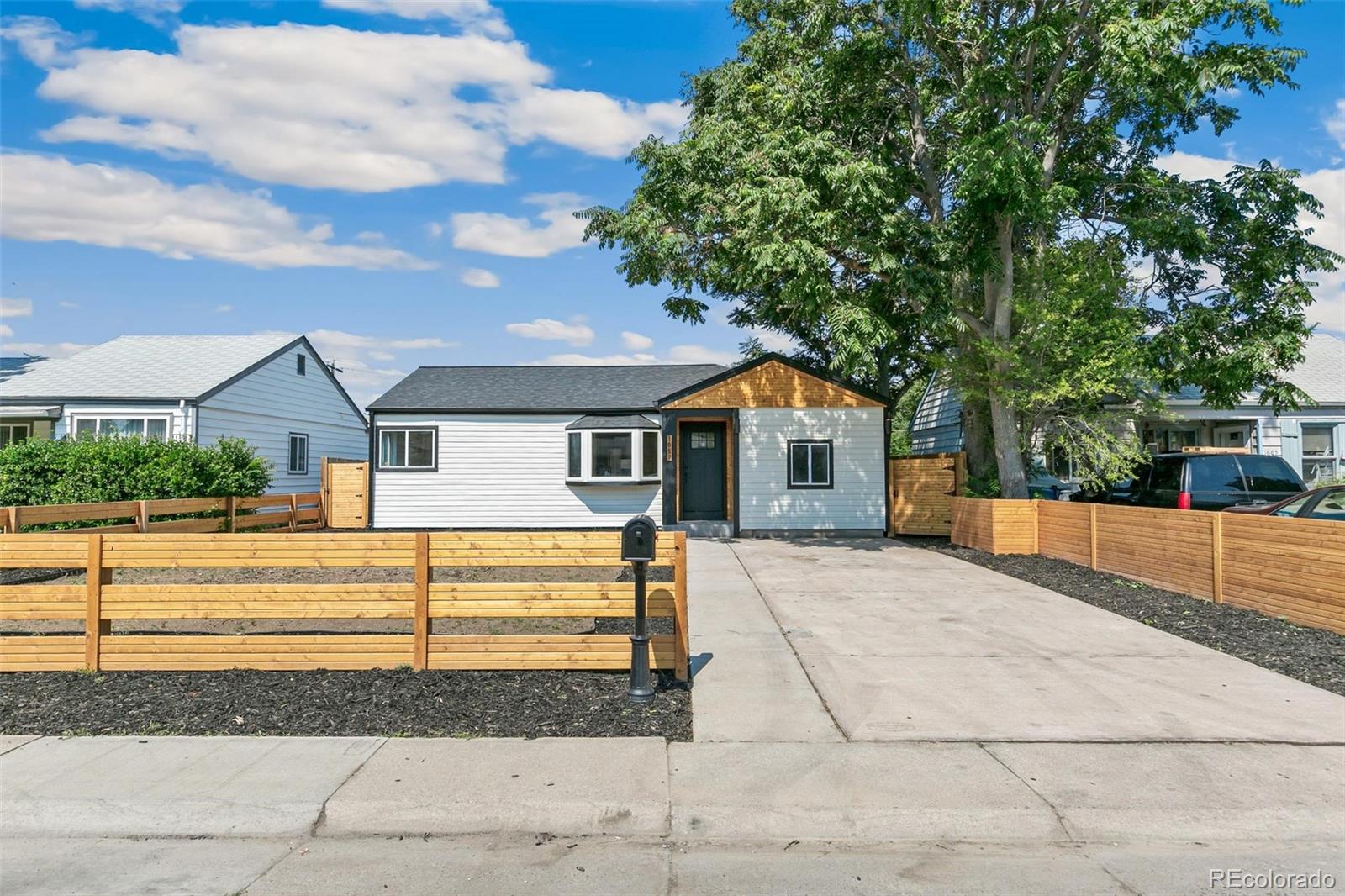  Aurora Home | MLS #: 96555961657  Macon Street, Aurora Beds: 4 Baths: 2 Price: $439,000