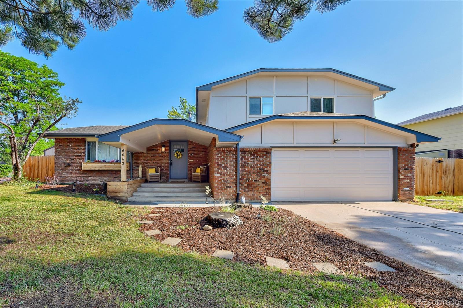  Littleton Home | MLS #: 59458146063 W Indore Place, Littleton Beds: 4 Baths: 3 Price: $685,000