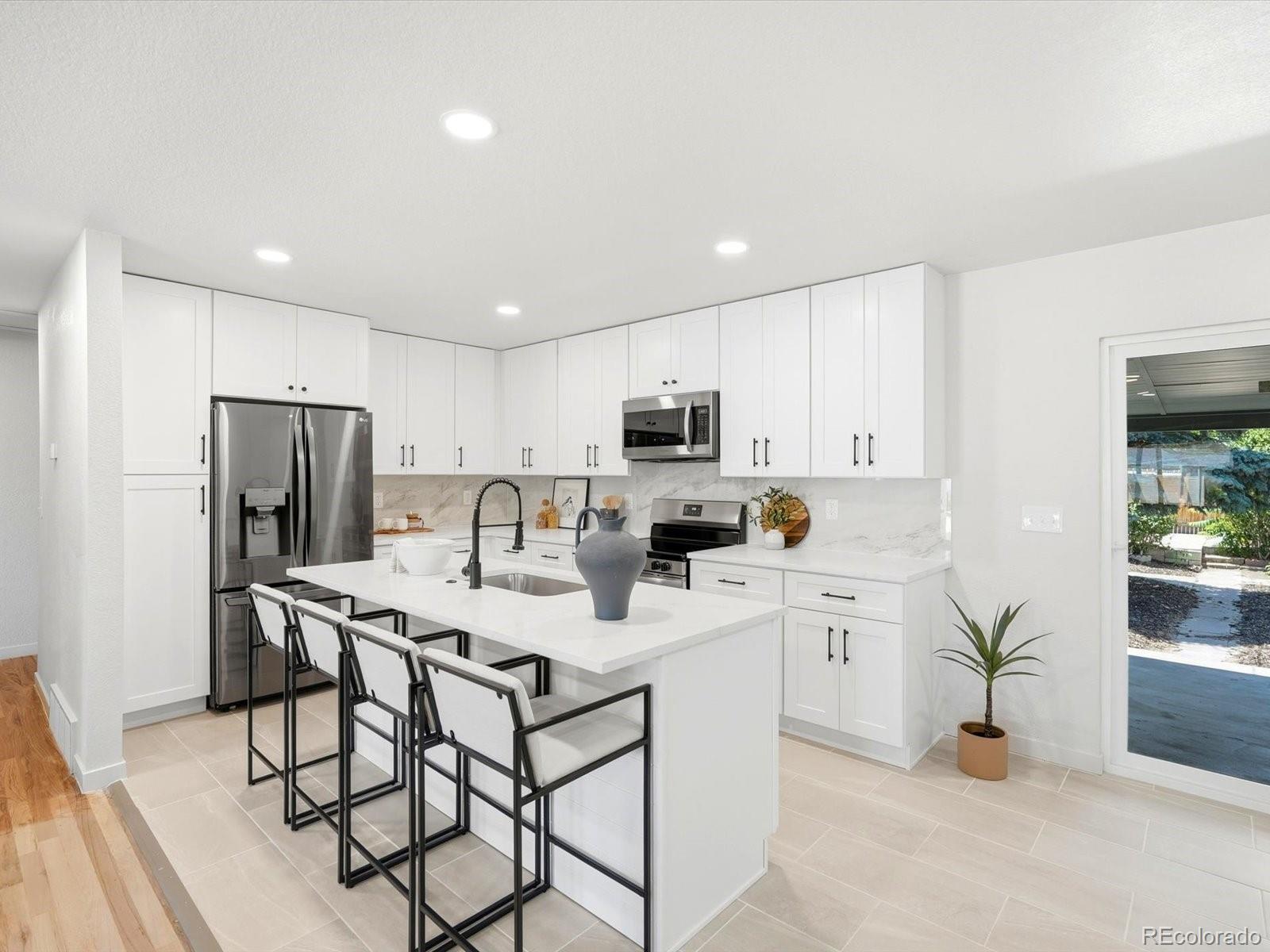 Lowry Denver Home | MLS #: 632934147 N Zenobia Street, Denver Beds: 4 Baths: 3 Price: $595,000