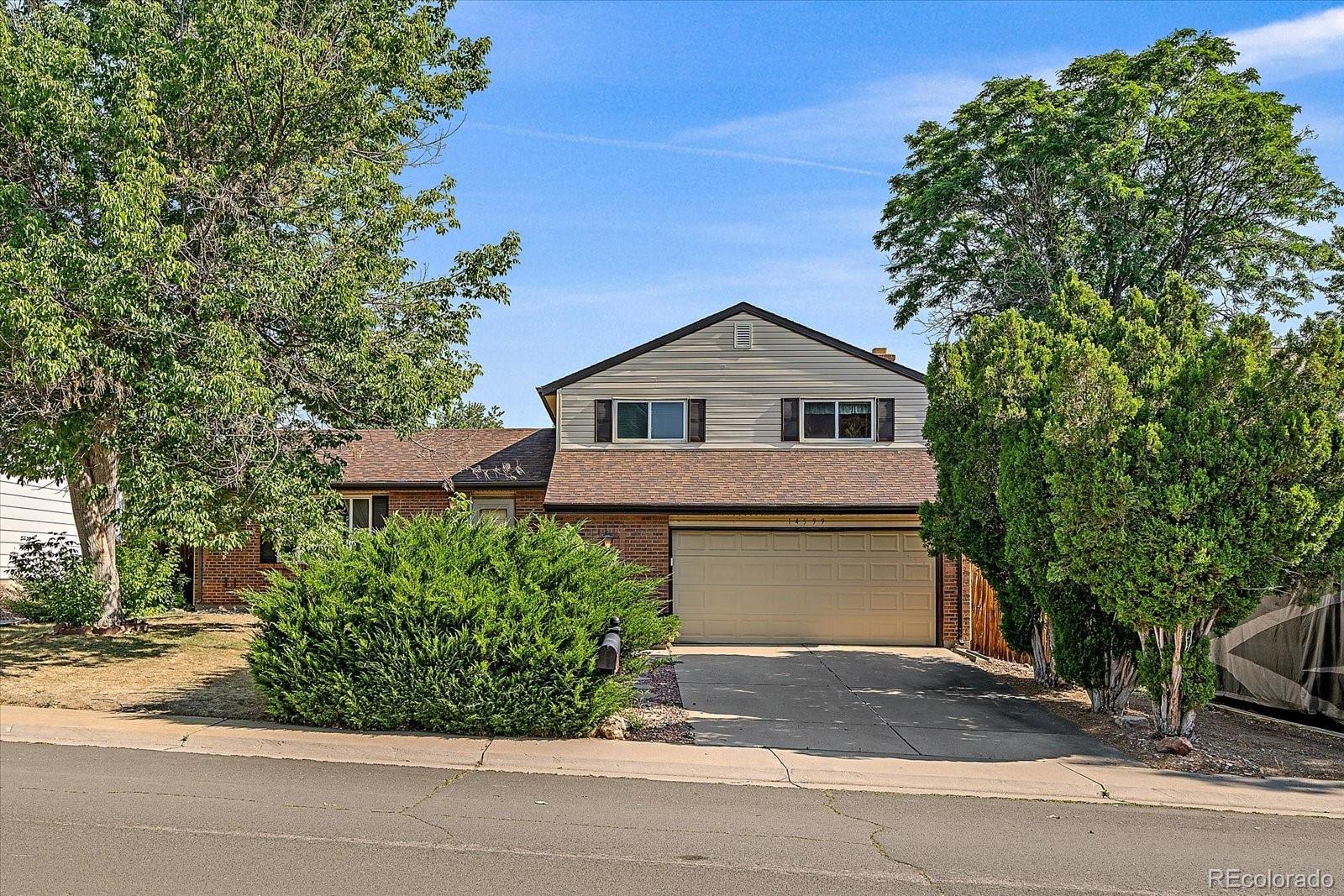 Woodrim Aurora Home | MLS #: 272164114599 E Evans Place, Aurora Beds: 5 Baths: 4 Price: $440,000