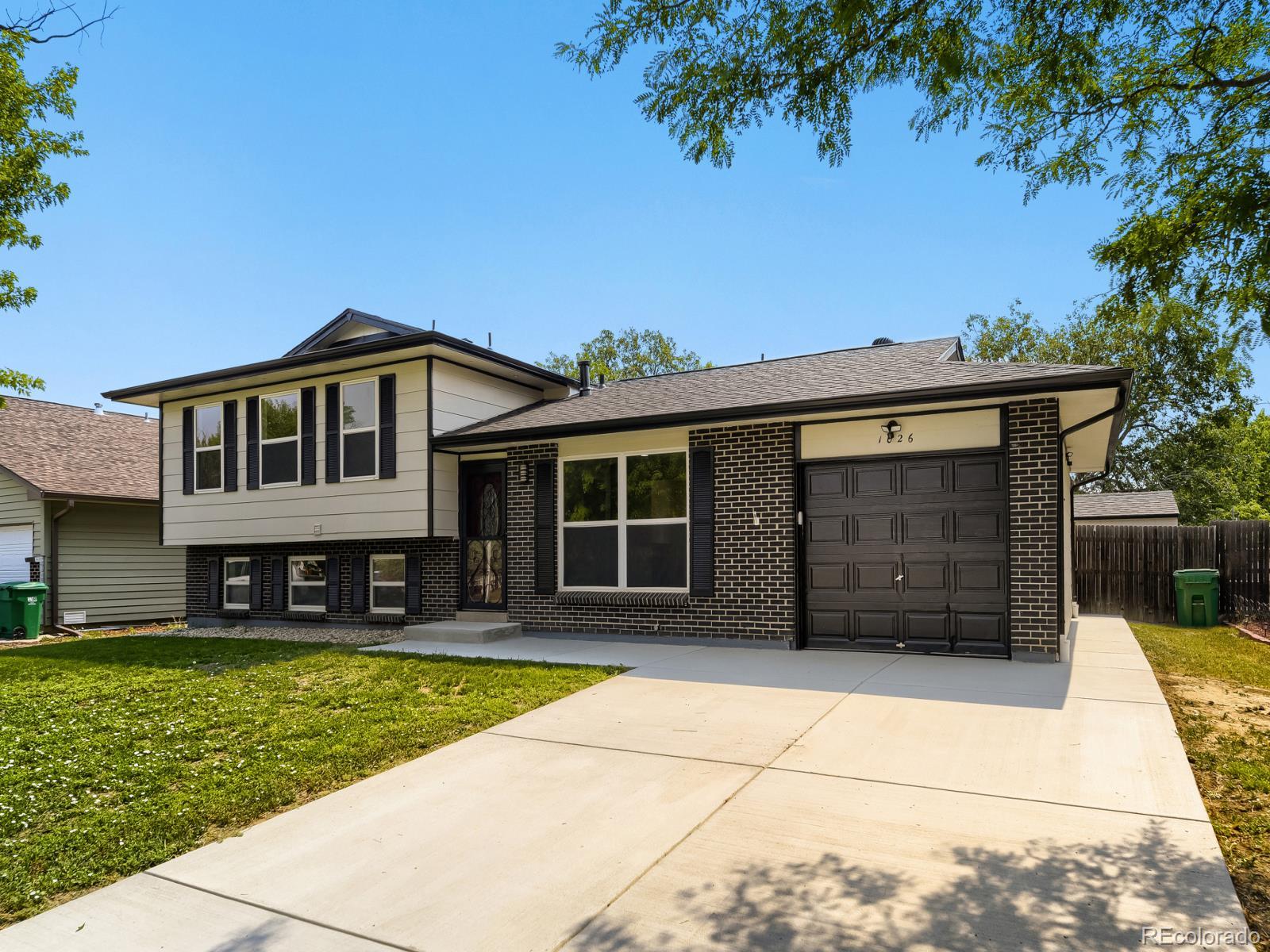  Aurora Home | MLS #: 43805991026  Mobile Street, Aurora Beds: 4 Baths: 2 Price: $480,000