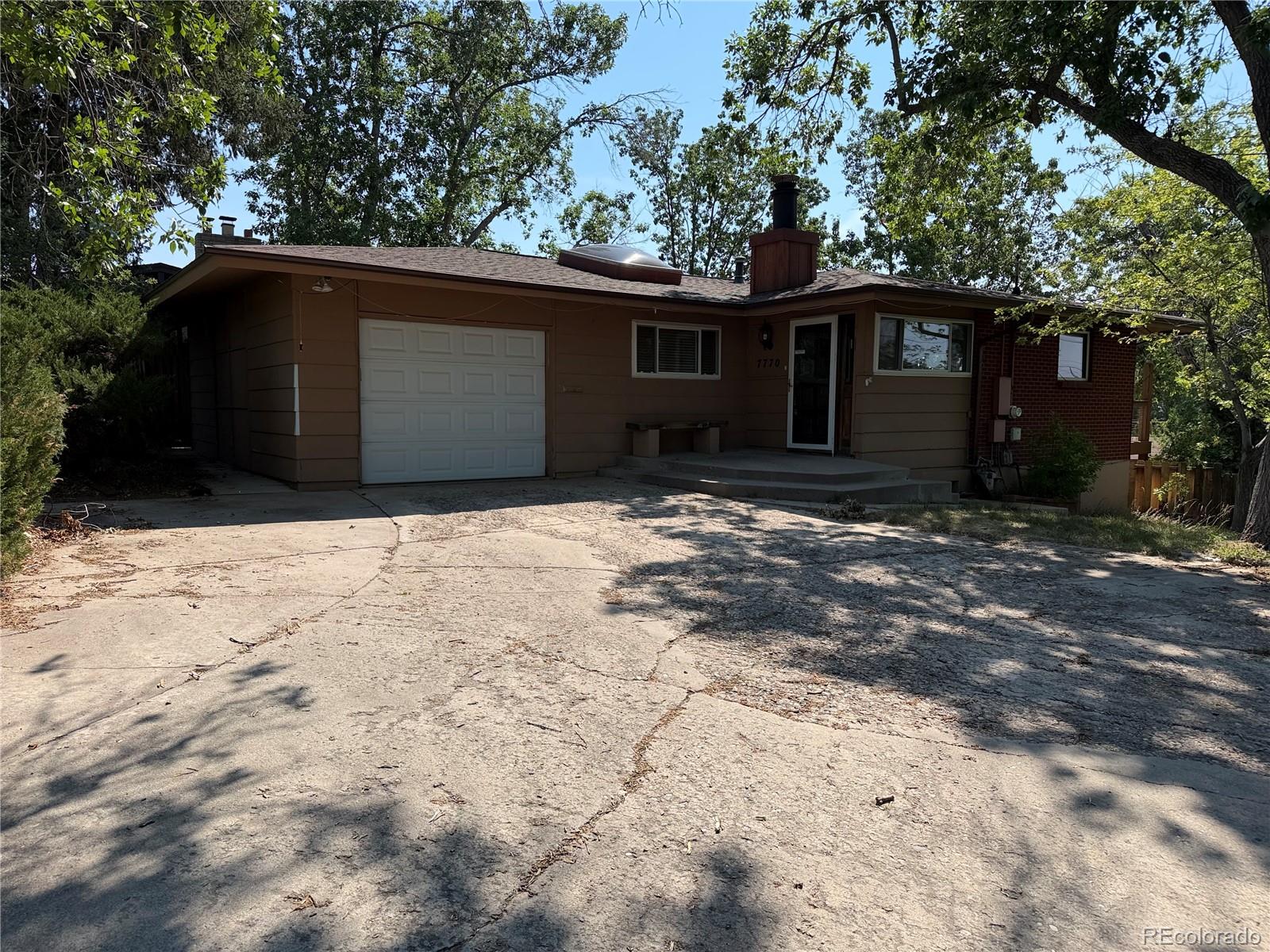 Columbine Hills Littleton Home | MLS #: 91319577770 S Sheridan Court, Littleton Beds: 4 Baths: 3 Price: $467,750