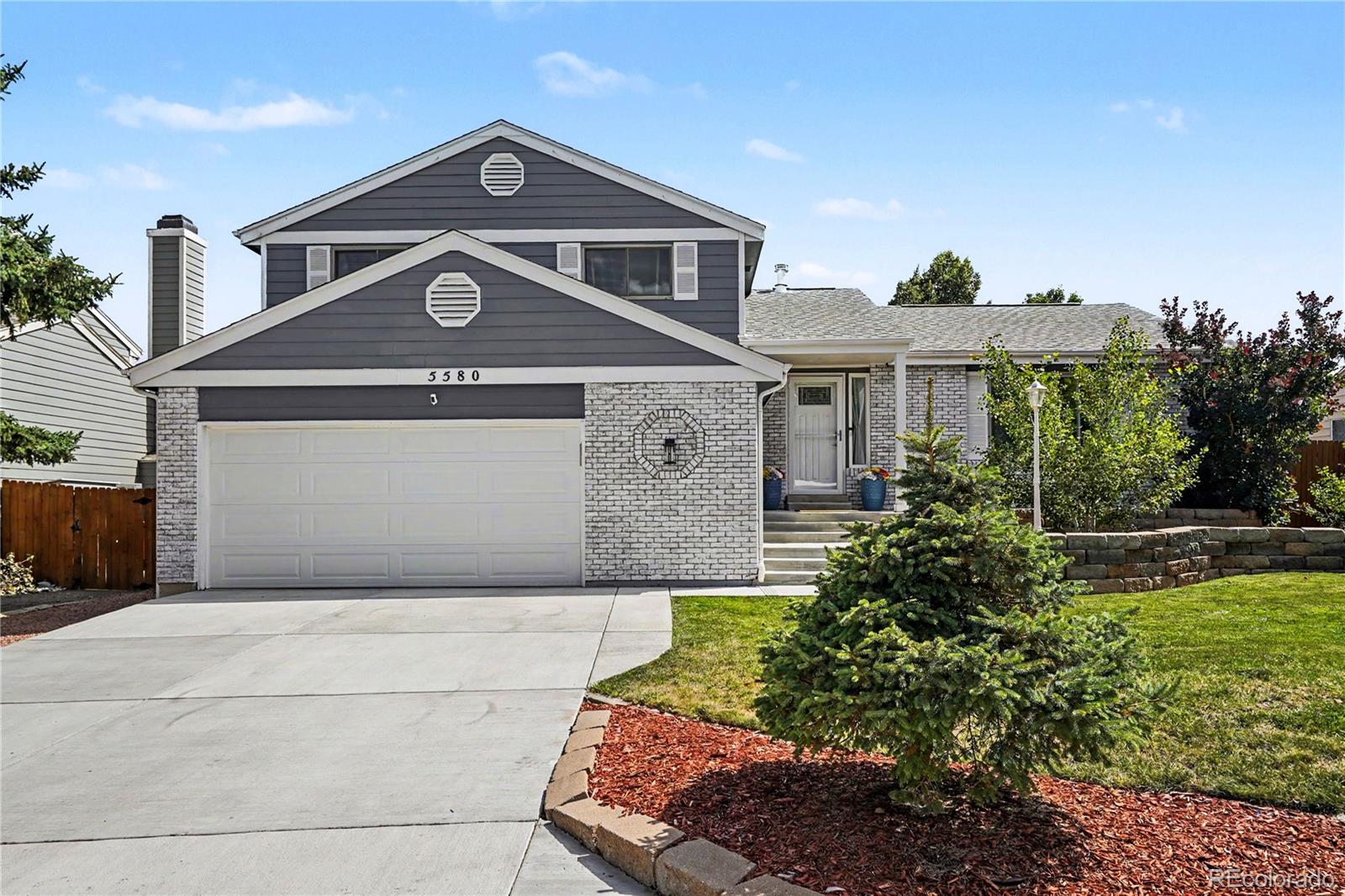 Wood Creek Arvada Home | MLS #: 18567465580 W 74th Avenue, Arvada Beds: 5 Baths: 3 Price: $628,000