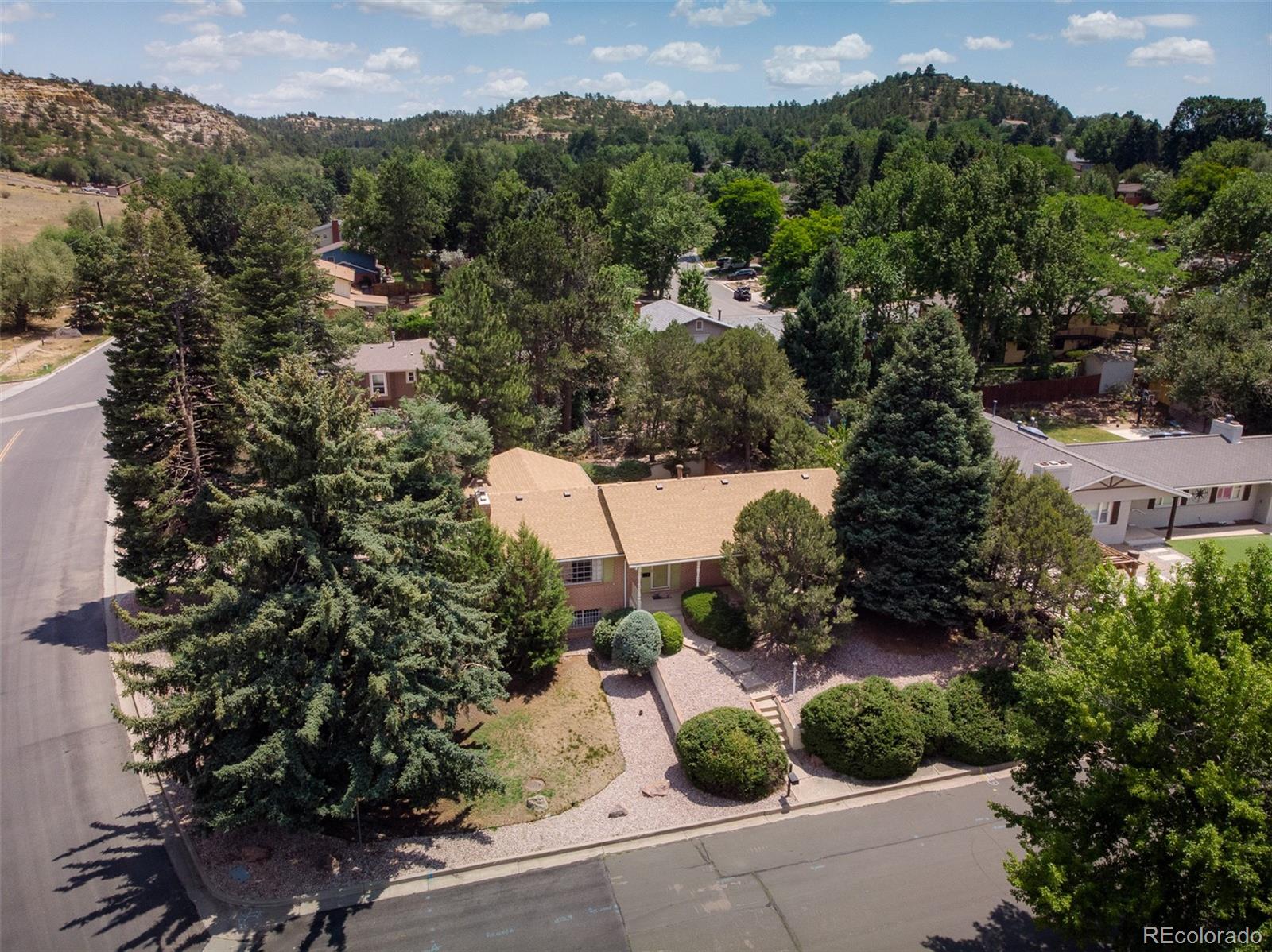  Colorado Springs Home | MLS #: 21394153135  Lees Lane, Colorado Springs Beds: 4 Baths: 3 Price: $499,900