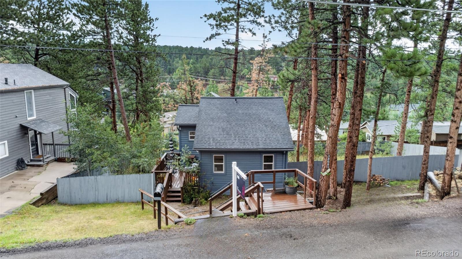  Evergreen Home | MLS #: 512104030063  Spruce Road, Evergreen Beds: 2 Baths: 1 Price: $350,000