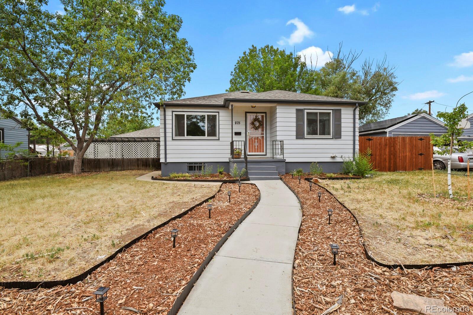  Denver Home | MLS #: 8544957875 S Quivas Street, Denver Beds: 4 Baths: 2 Price: $539,999