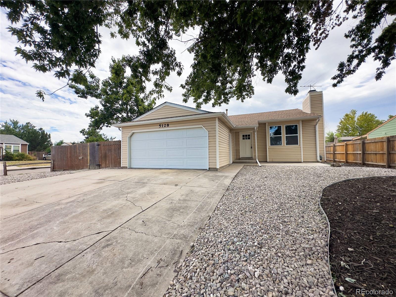 Montbello Denver Home | MLS #: 21846365128  Columbus Way, Denver Beds: 4 Baths: 2 Price: $445,000