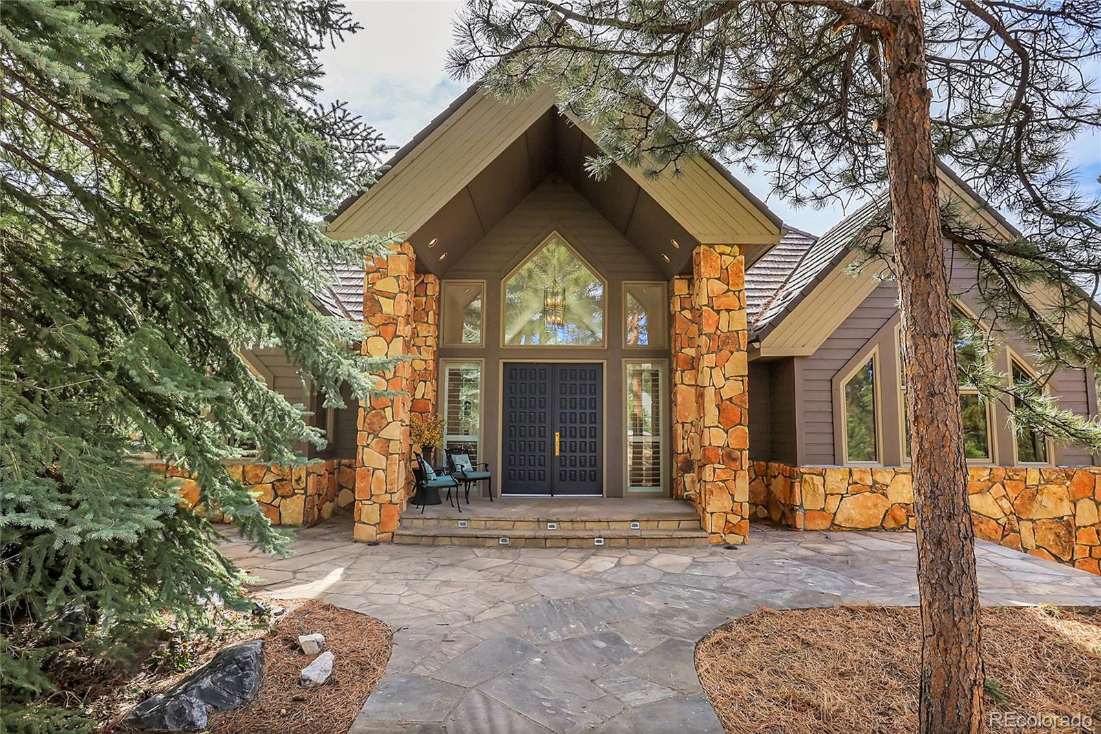 7116  Timbers Drive, evergreen MLS: 7849549 Beds: 4 Baths: 4 Price: $1,400,000