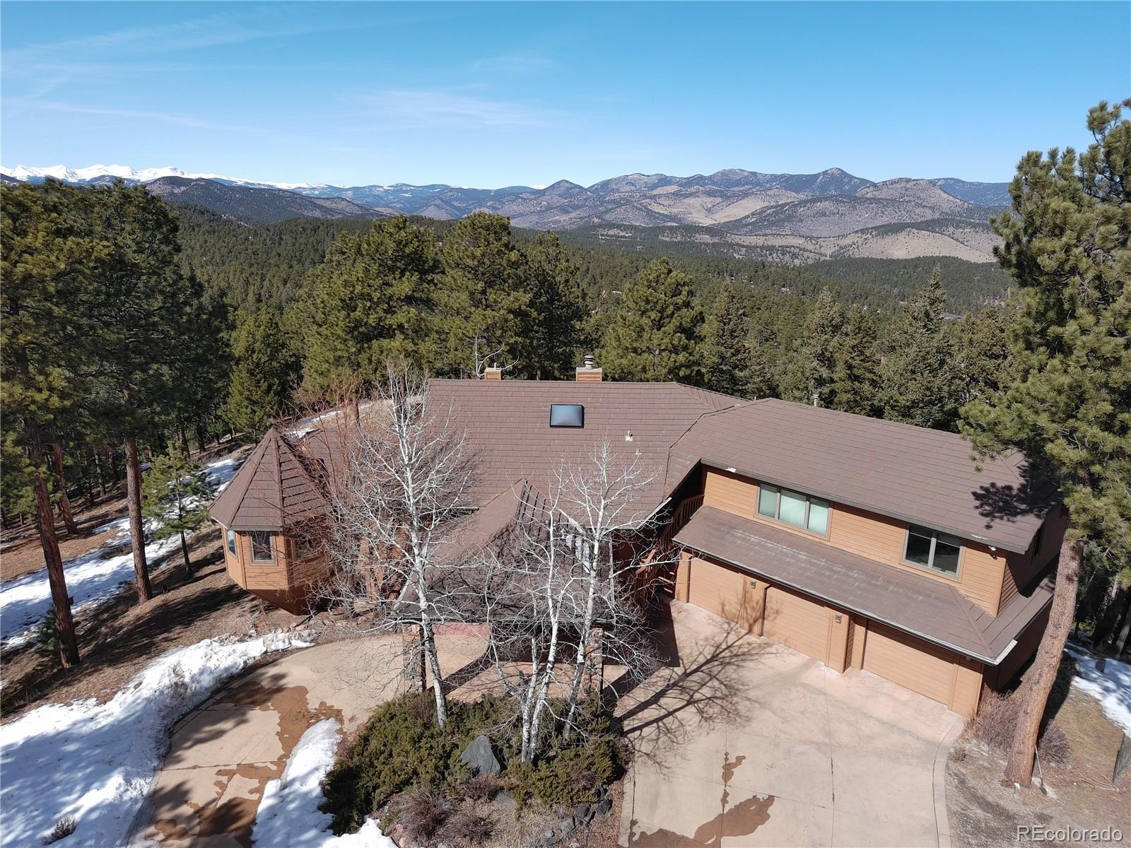 903  Wagon Trail Road, evergreen MLS: 8730622 Beds: 4 Baths: 4 Price: $1,925,000