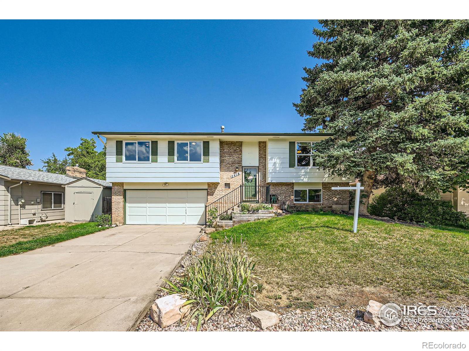 2418  Leghorn Drive, fort collins MLS: 4567891017609 Beds: 4 Baths: 3 Price: $565,000