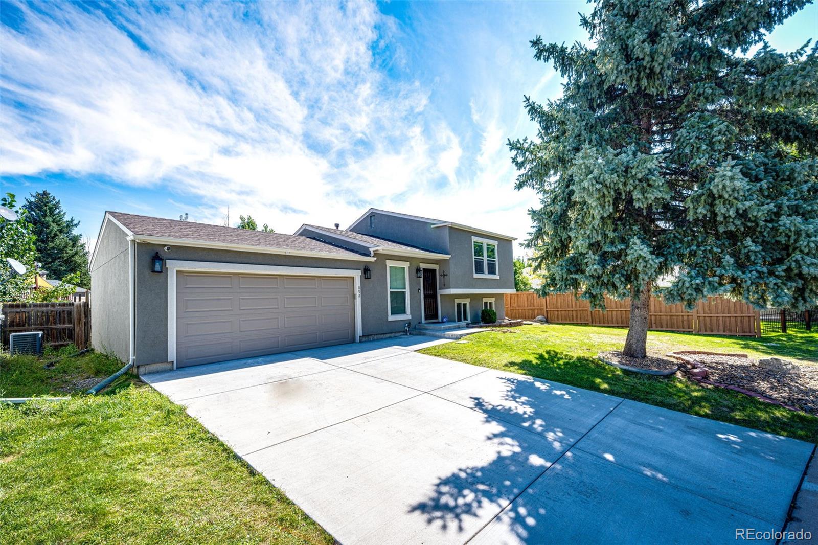 8892  Cottonwood Way, parker MLS: 8871087 Beds: 4 Baths: 2 Price: $550,000