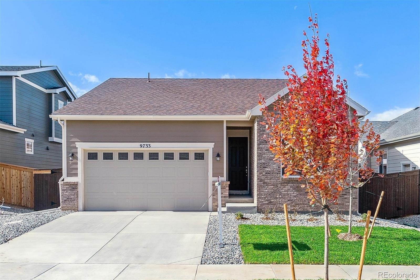 9733  Ceylon Street, commerce city MLS: 6290266 Beds: 4 Baths: 3 Price: $527,950