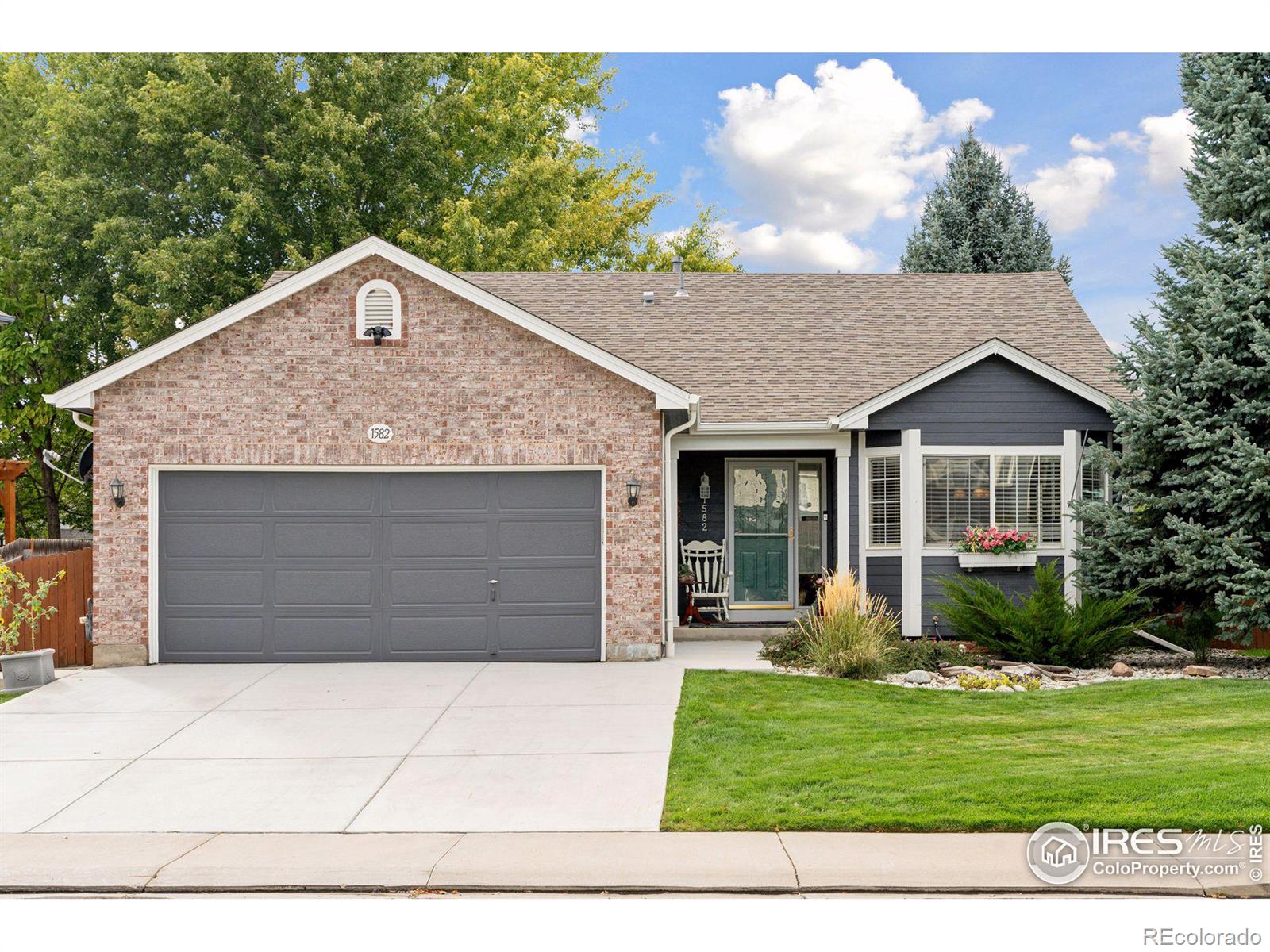 1582  Cedarwood Drive, longmont MLS: 4567891018933 Beds: 4 Baths: 3 Price: $689,400