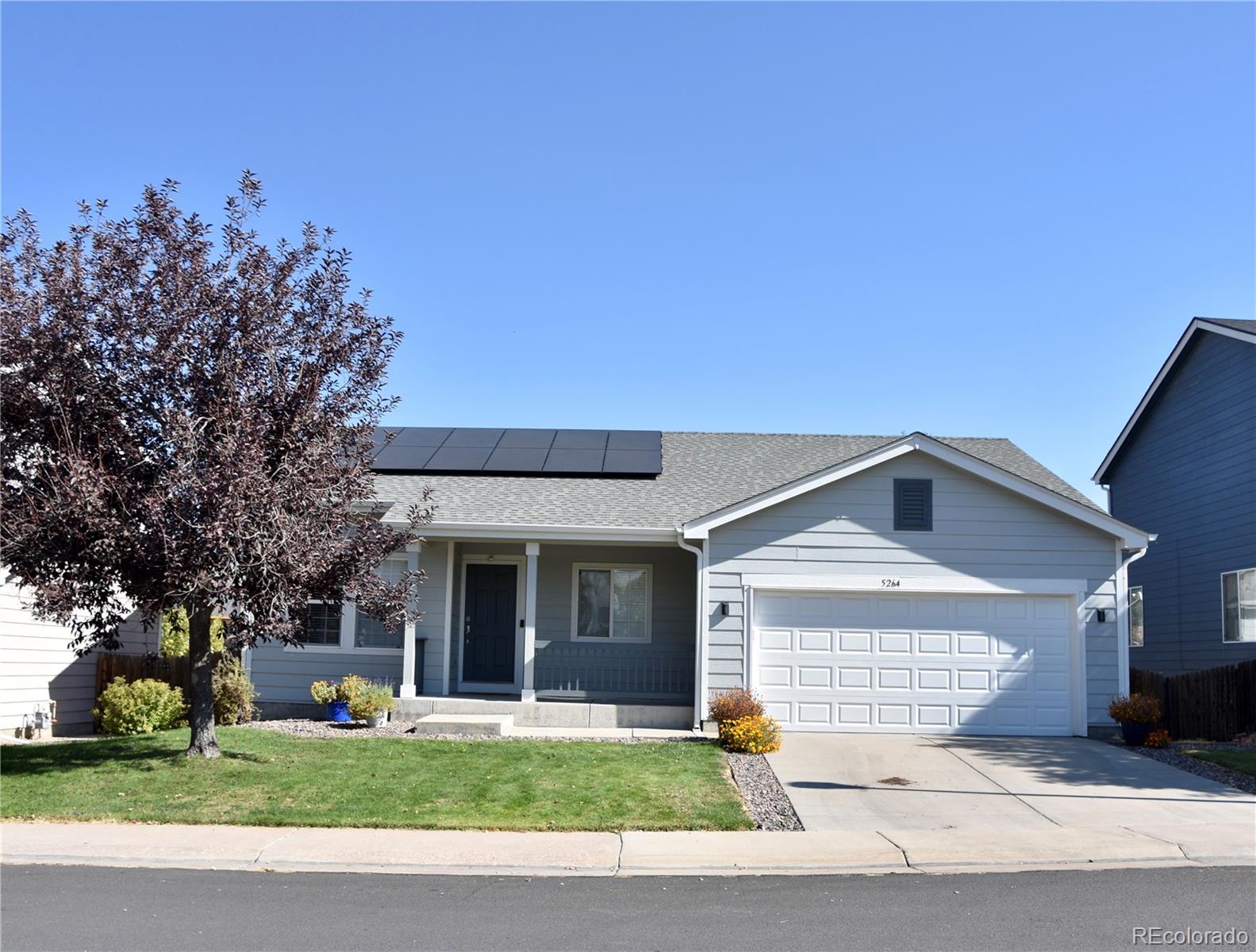 5264 S Rome Street, aurora MLS: 7009647 Beds: 5 Baths: 3 Price: $609,000