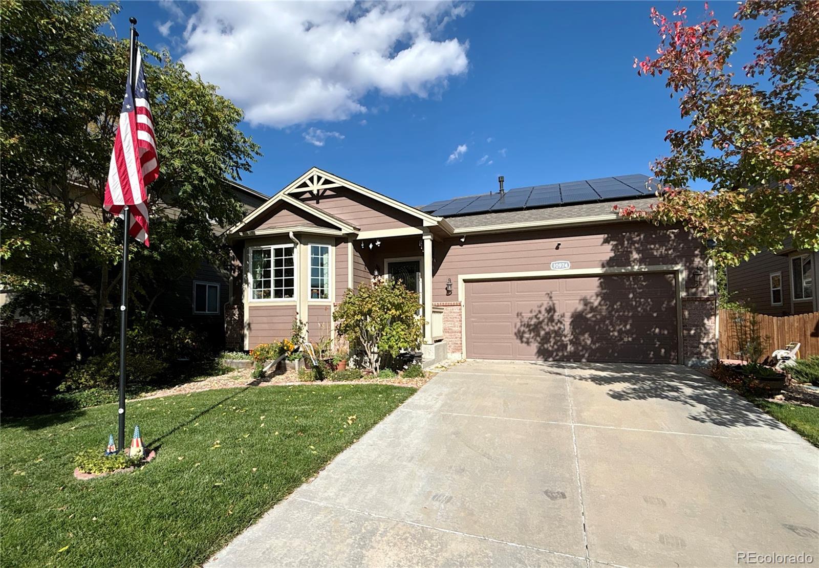 10974  Lansing Court, commerce city MLS: 5524376 Beds: 5 Baths: 3 Price: $585,000