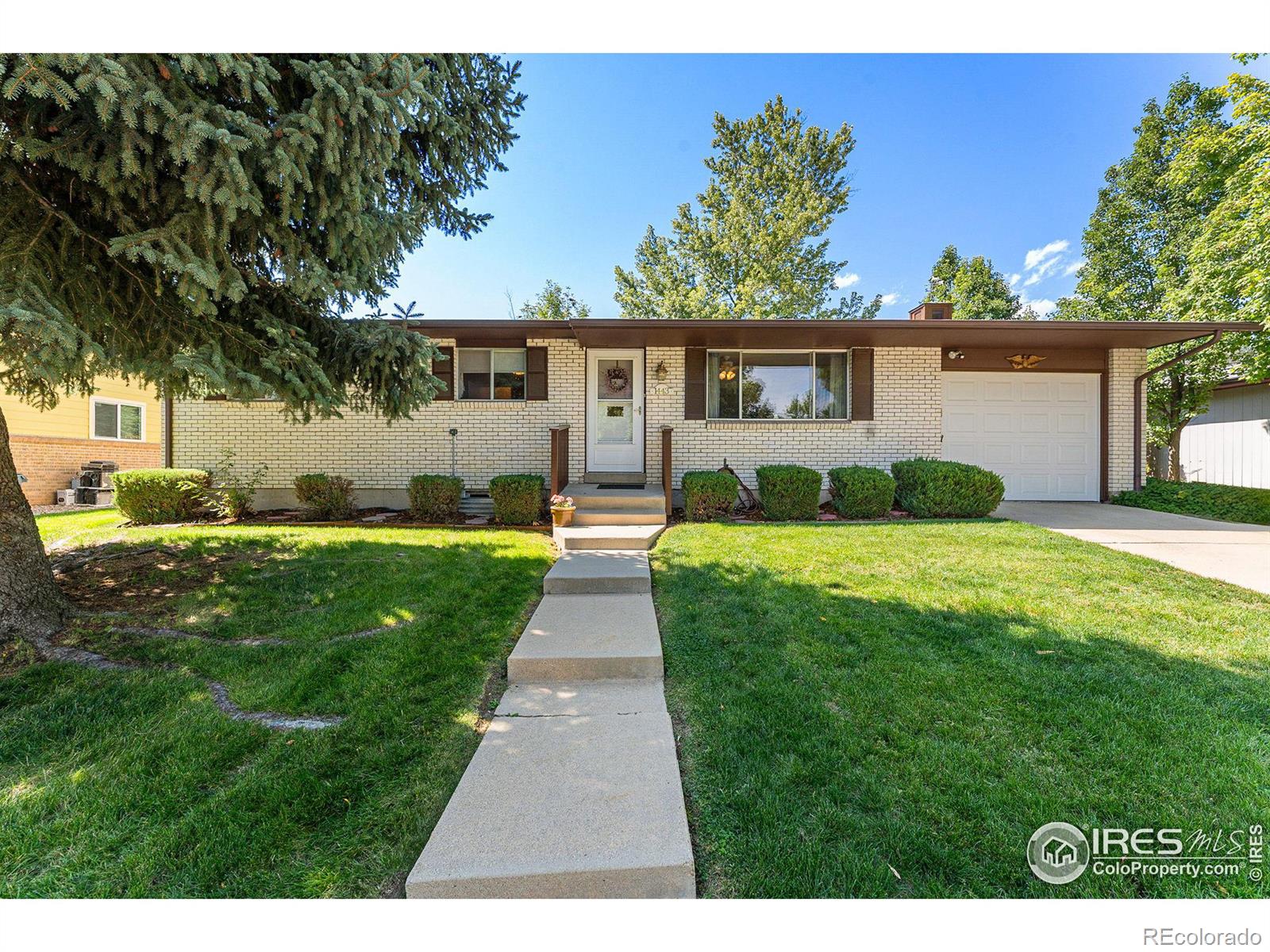 1443  Twin Sisters Drive, longmont MLS: 4567891021812 Beds: 4 Baths: 2 Price: $420,000