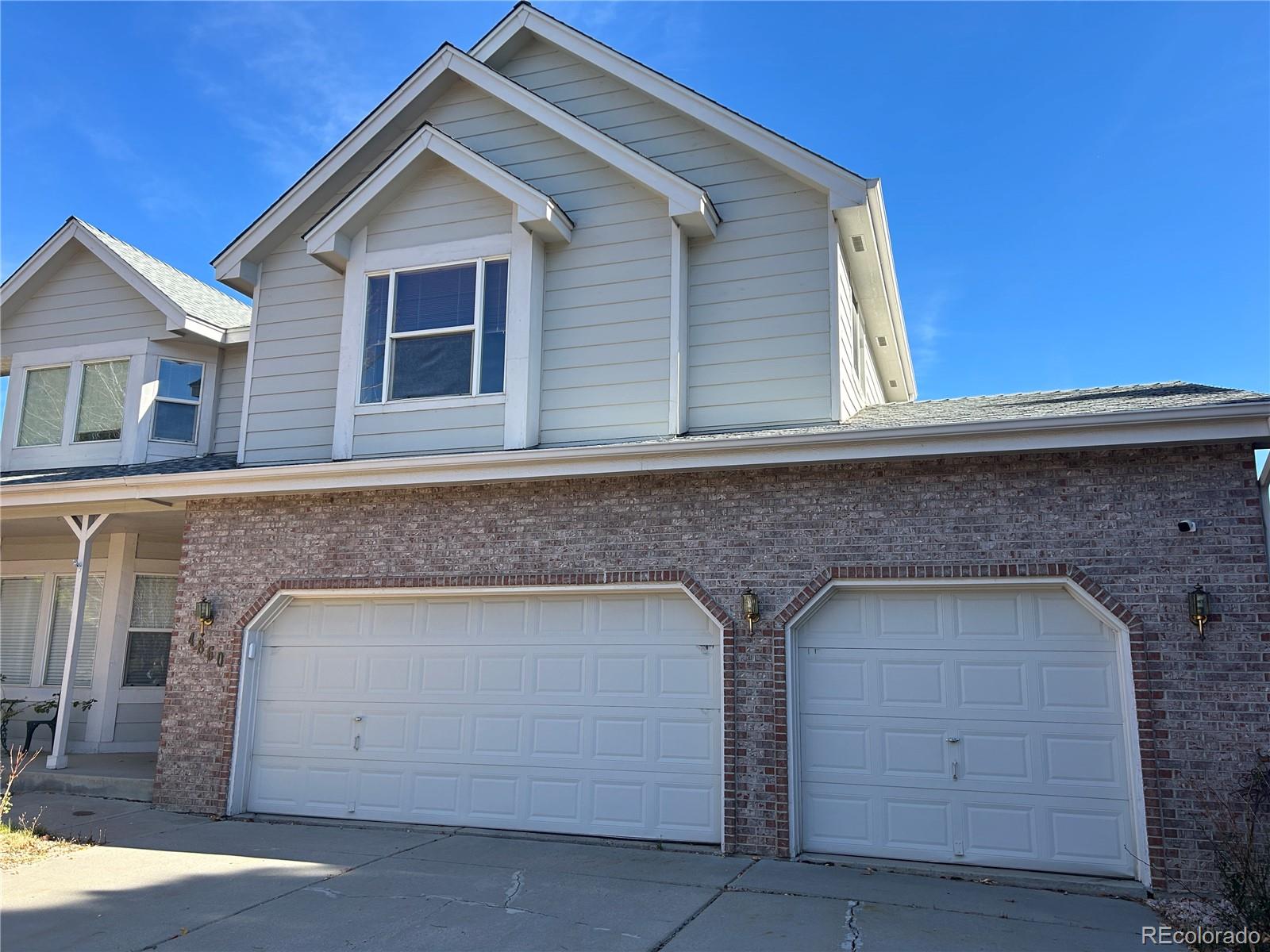 4860  Bluesky Drive, castle rock MLS: 1976104 Beds: 3 Baths: 3 Price: $675,000