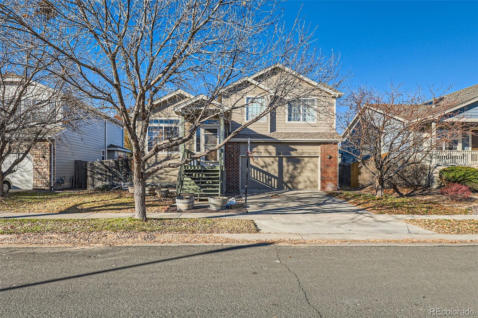 10461  Tucson Street, commerce city MLS: 7522113 Beds: 4 Baths: 3 Price: $490,000