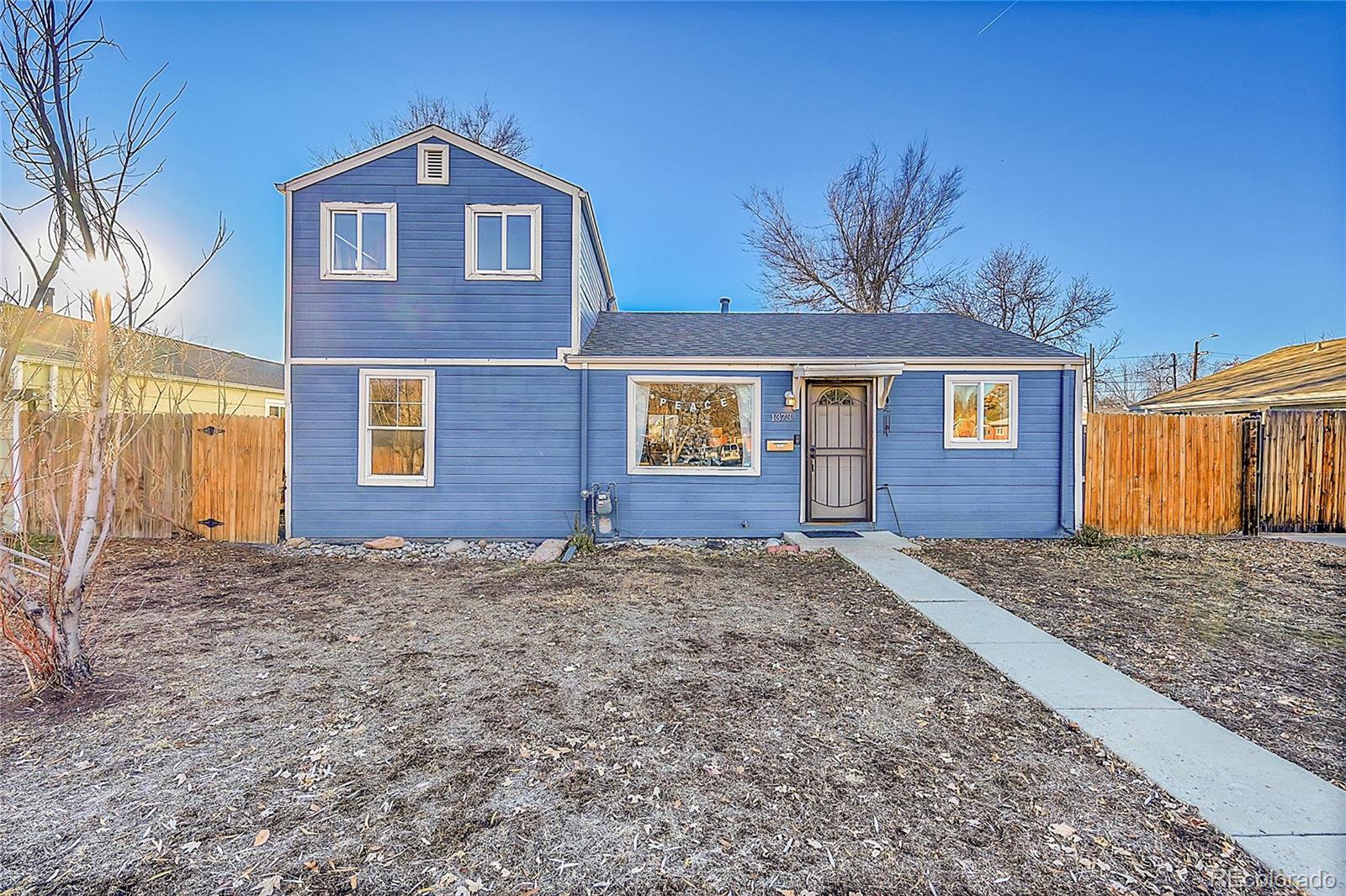 1373 S Wolff Street, denver MLS: 6673528 Beds: 4 Baths: 3 Price: $400,000