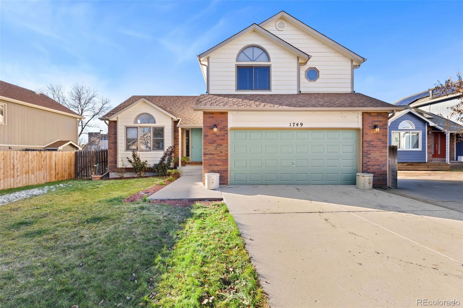 1749  Foster Drive, longmont MLS: 3726832 Beds: 4 Baths: 3 Price: $625,000