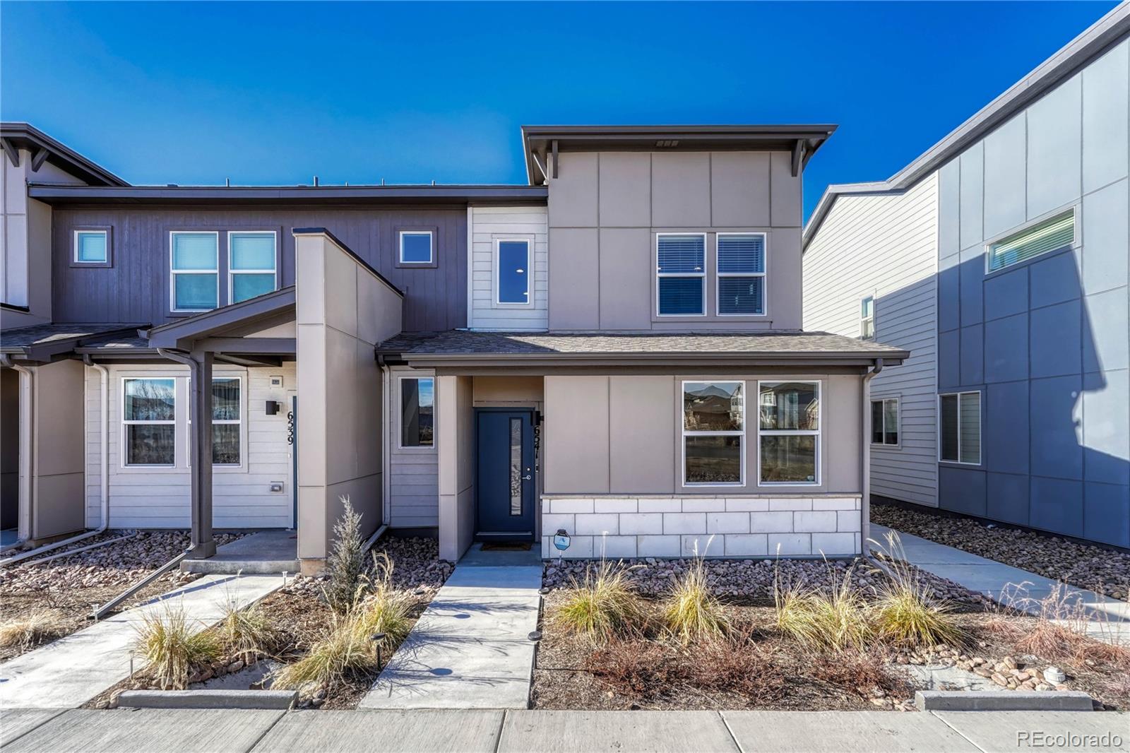 6541 N Dunkirk Street , Denver  MLS: 5742308 Beds: 3 Baths: 3 Price: $459,500