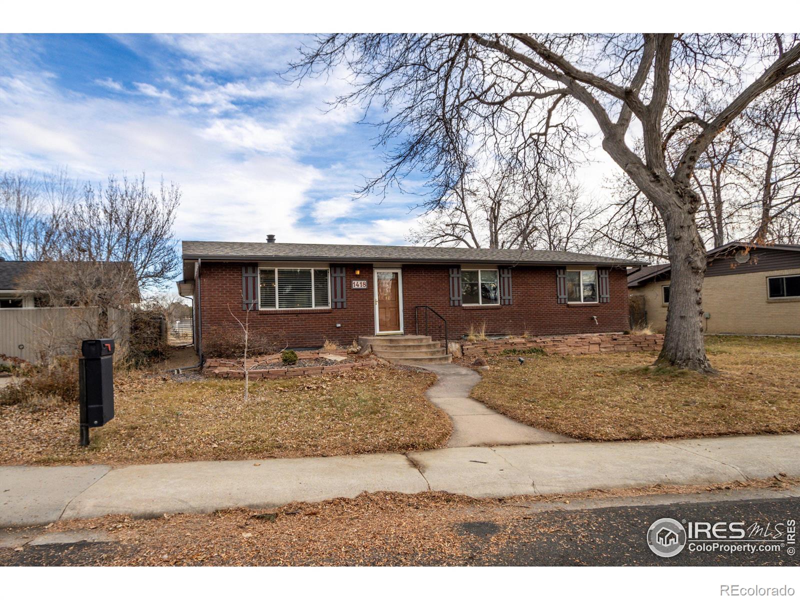 1418  Sunset Street, longmont MLS: 4567891023724 Beds: 4 Baths: 3 Price: $575,000