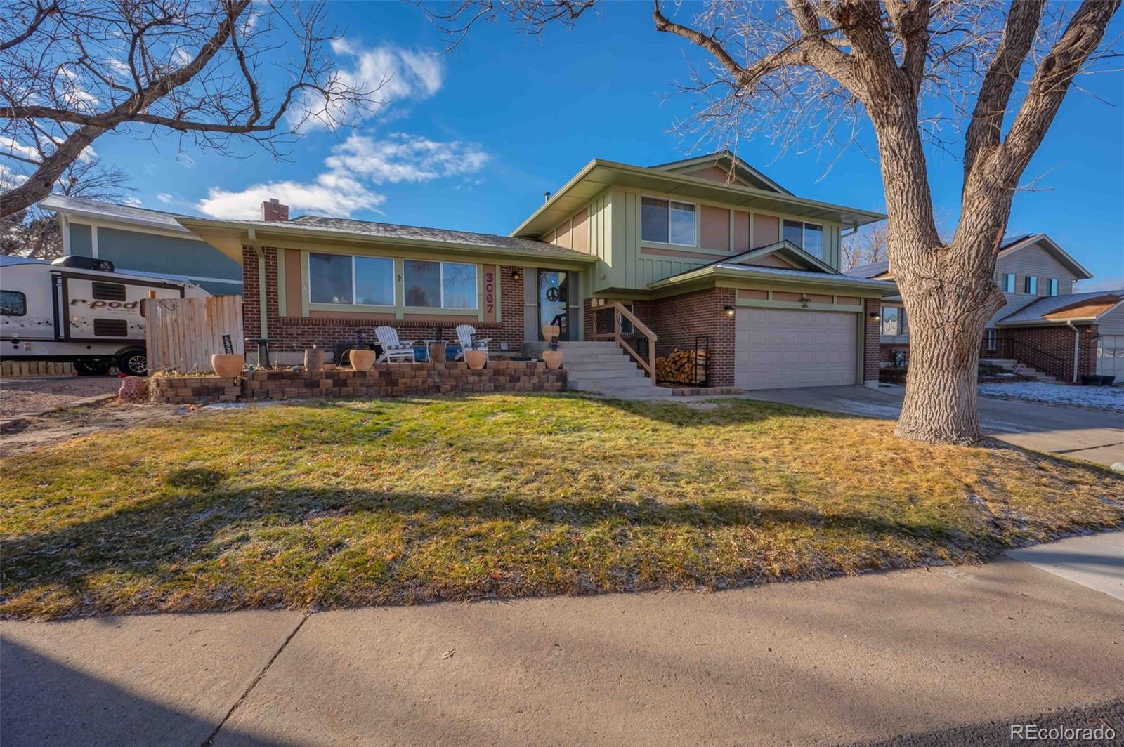 3067 S Pitkin Way, aurora MLS: 2333128 Beds: 5 Baths: 3 Price: $560,000