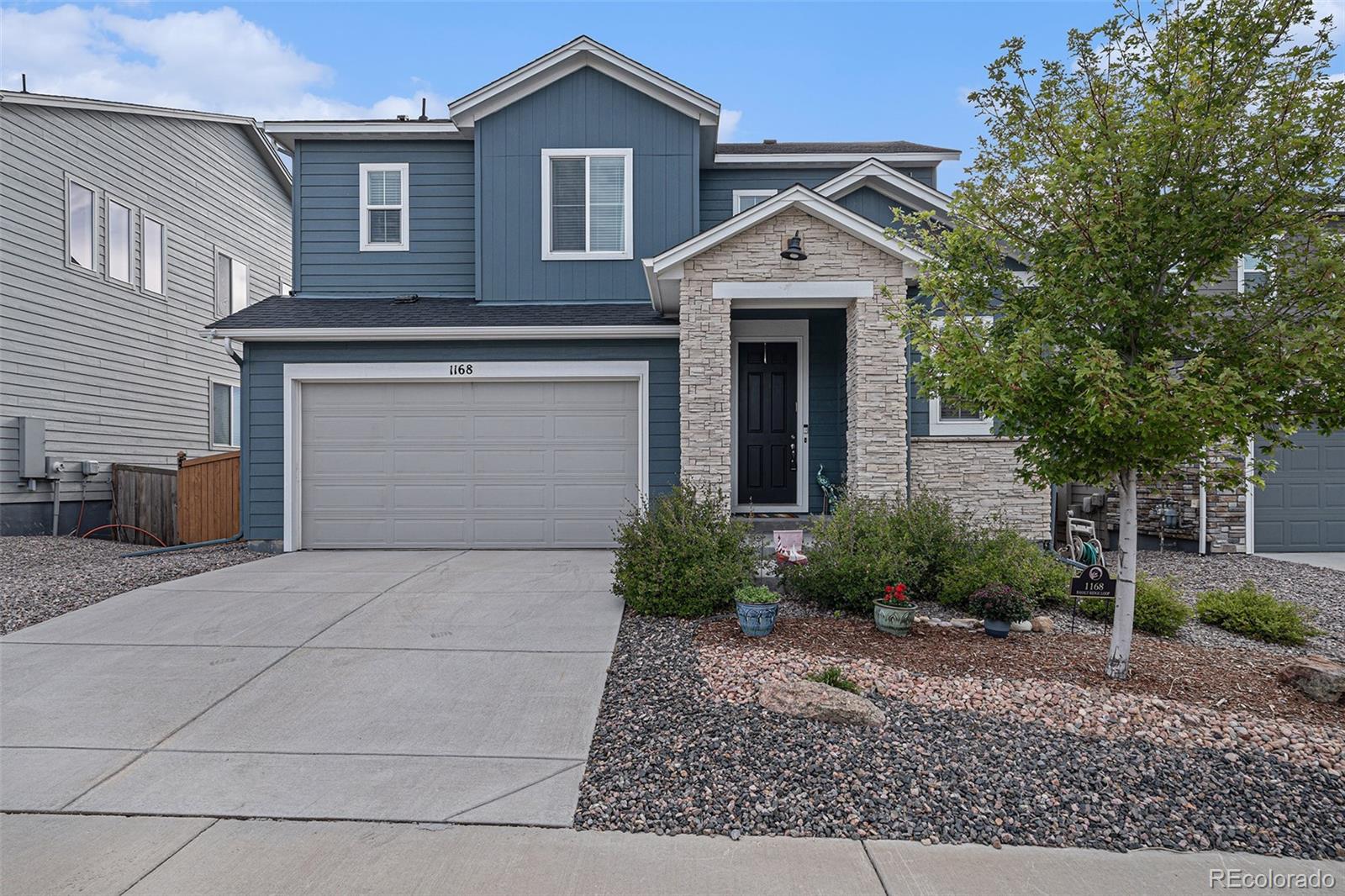 1168  Basalt Ridge Loop, castle rock MLS: 9926558 Beds: 4 Baths: 4 Price: $660,000