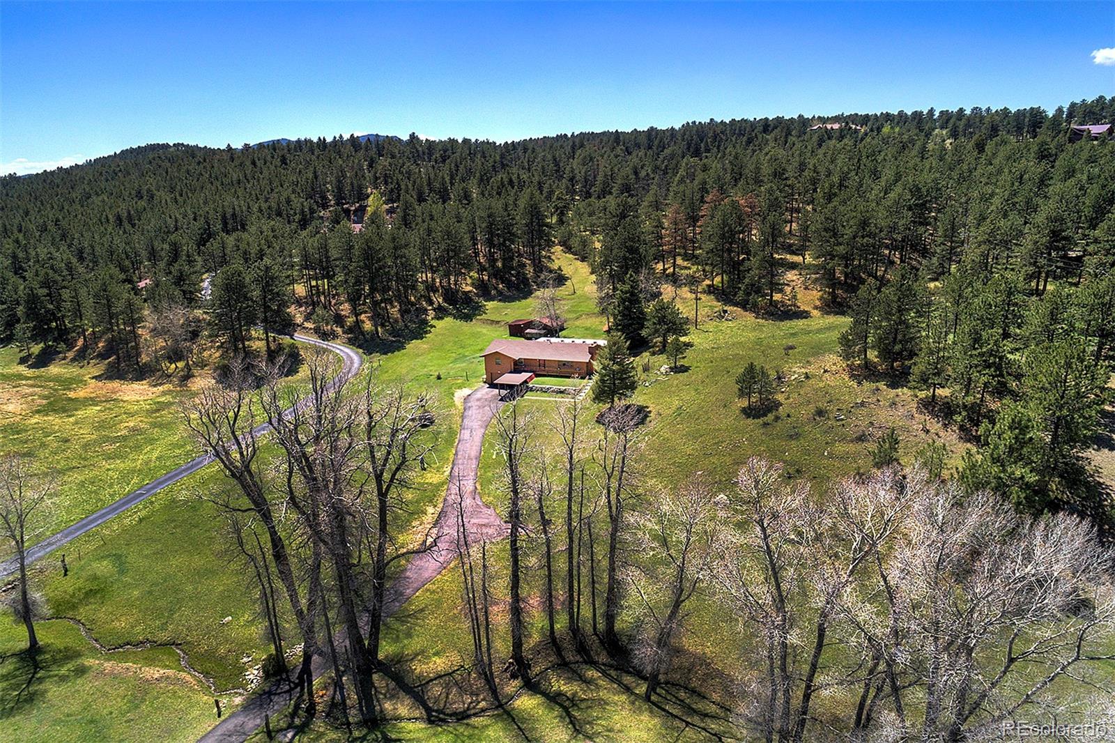 1971  Kerr Gulch Road, evergreen MLS: 8796614 Beds: 3 Baths: 2 Price: $1,050,000