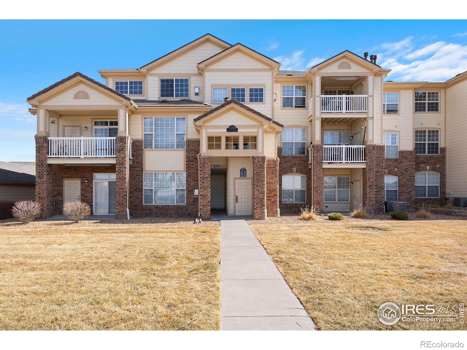 5735 N Genoa Way 11-205, Aurora  MLS: 4567891028402 Beds: 2 Baths: 2 Price: $324,000