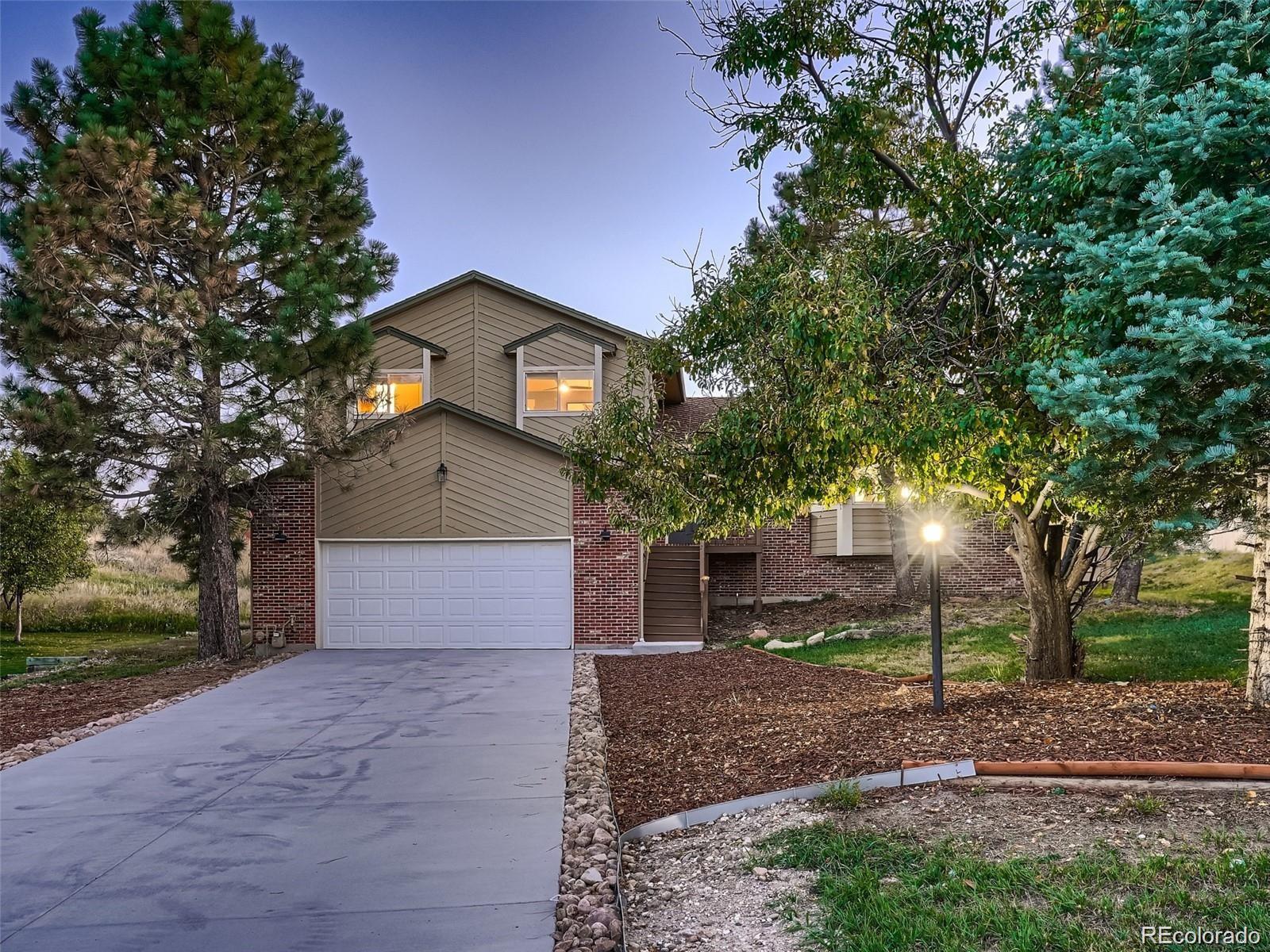 8916  Sunridge Hollow Road, parker MLS: 5058659 Beds: 3 Baths: 3 Price: $650,000