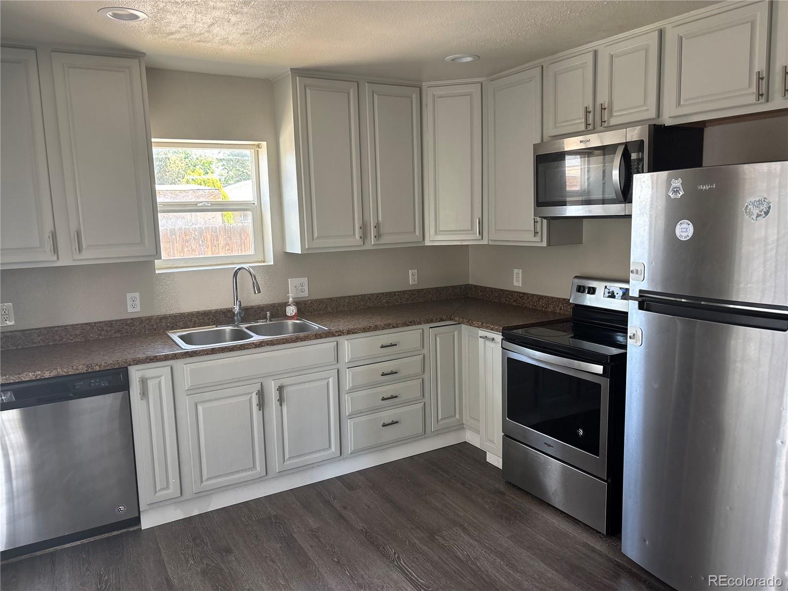 1222  Yosemite Street, denver MLS: 7064588 Beds: 3 Baths: 3 Price: $340,000