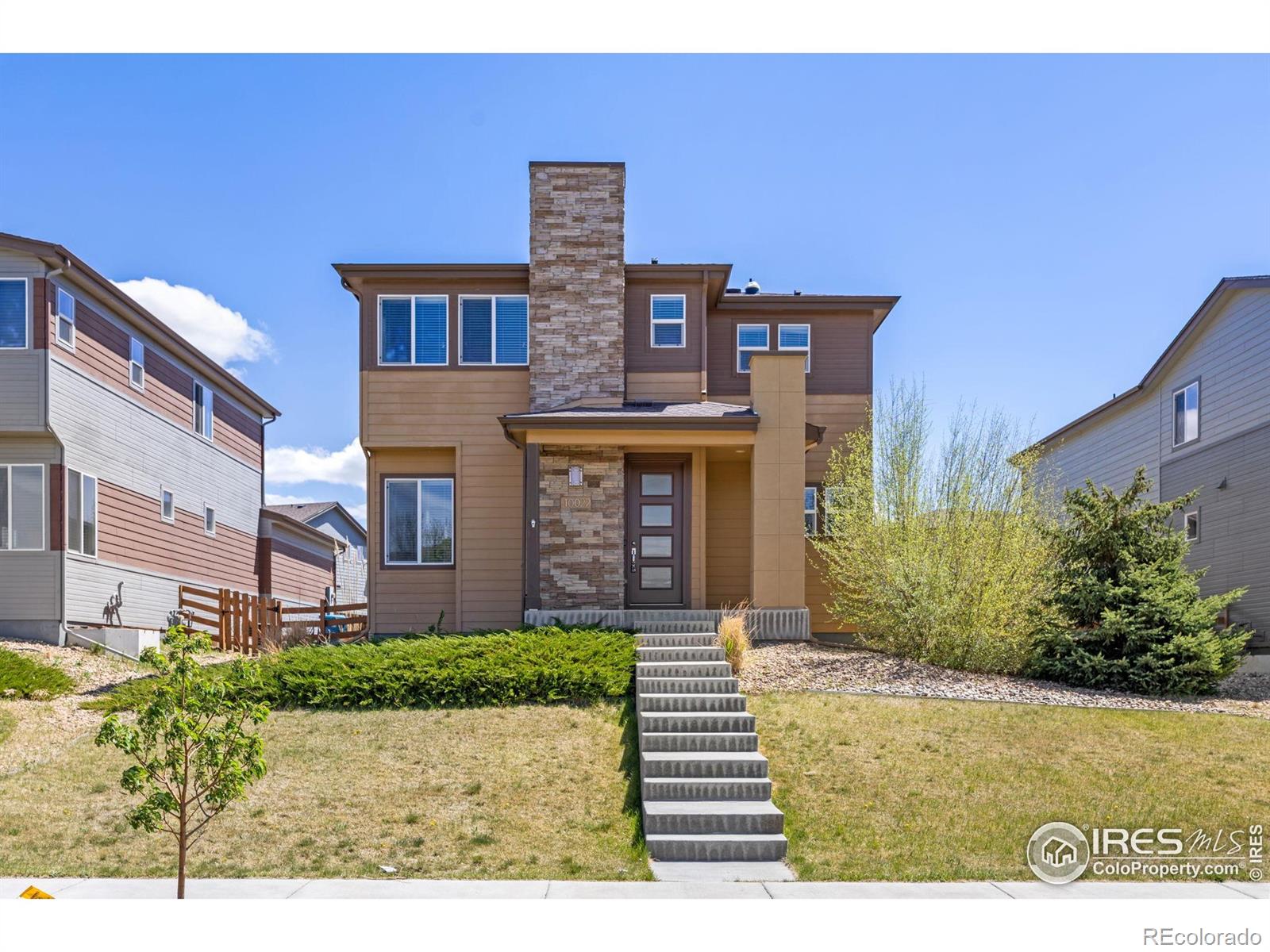 10022  Reunion Parkway, commerce city MLS: 4567891032879 Beds: 3 Baths: 3 Price: $547,000