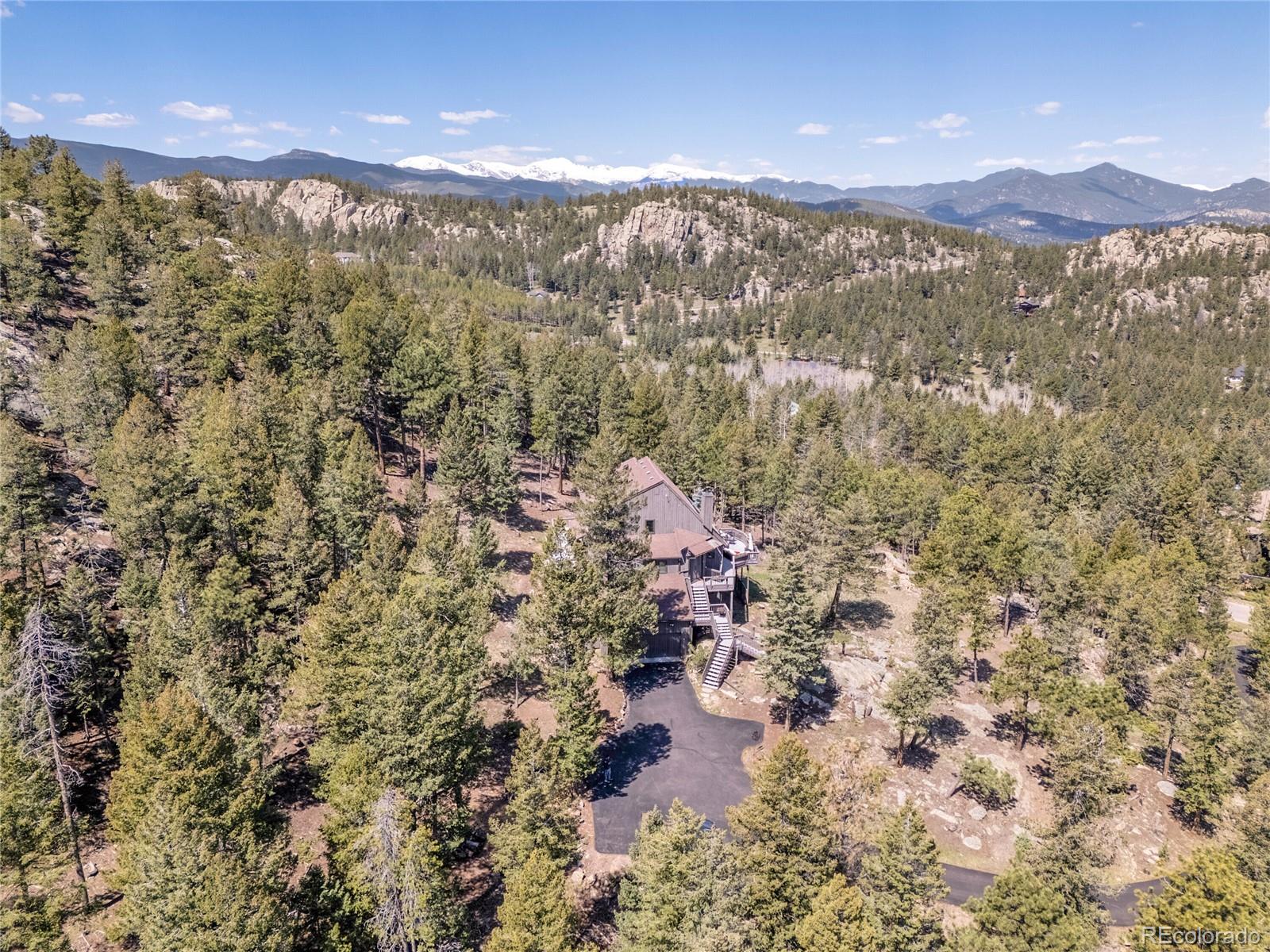 6574  Olympus Drive, evergreen MLS: 3756965 Beds: 4 Baths: 3 Price: $975,000