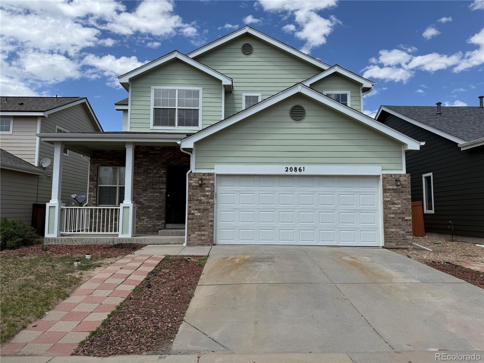 20861 E 40th Avenue, denver MLS: 8261636 Beds: 4 Baths: 3 Price: $559,900