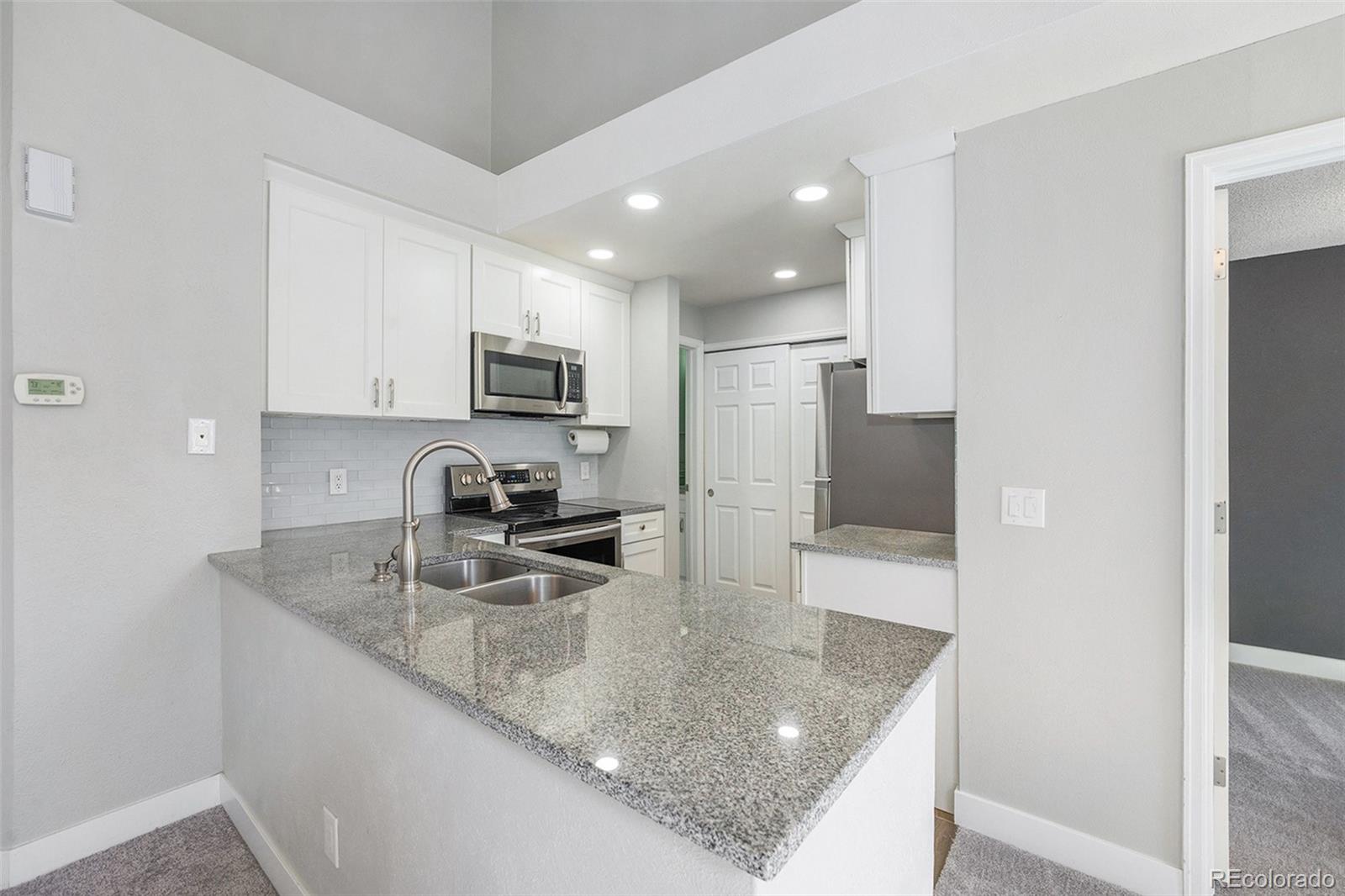 4076 S Carson Street H, Aurora  MLS: 4810404 Beds: 2 Baths: 1 Price: $299,000