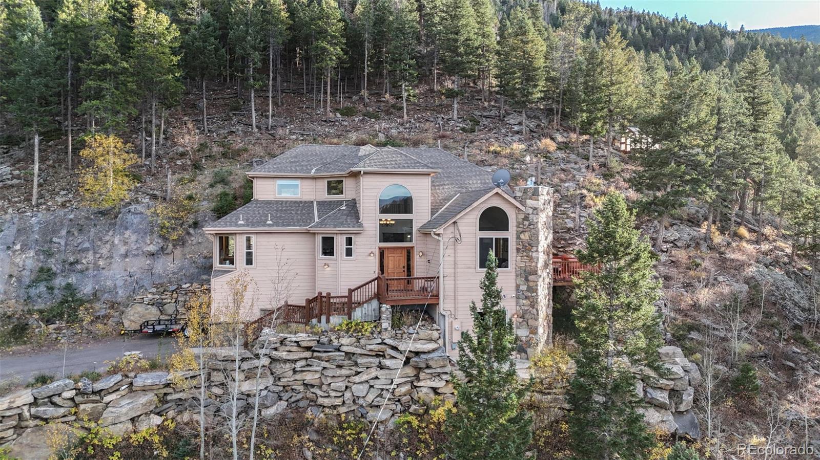 900  Sawmill Creek Road, evergreen MLS: 2117982 Beds: 3 Baths: 4 Price: $895,000