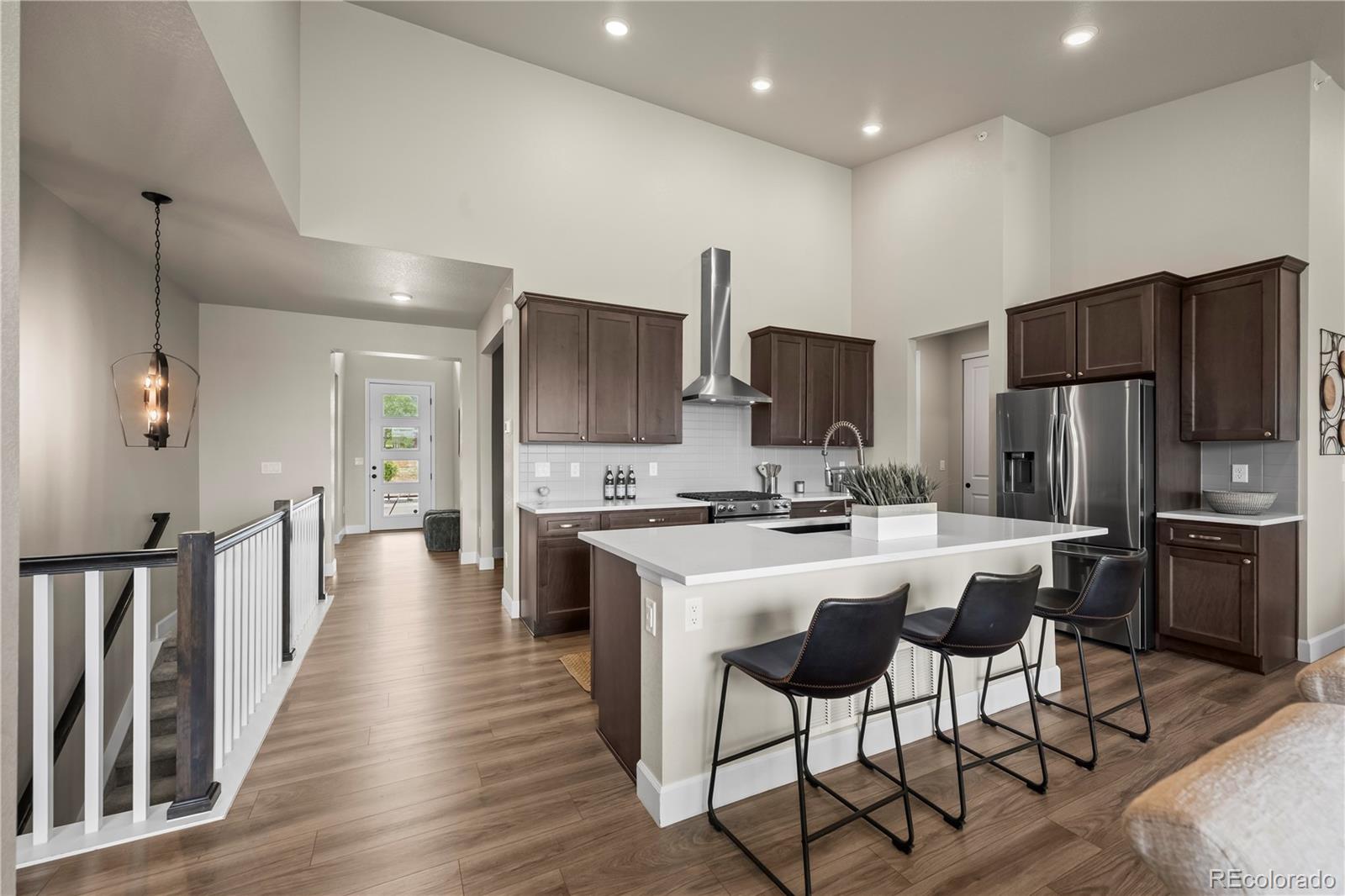8244 S Queen Street , Littleton  MLS: 7990826 Beds: 3 Baths: 3 Price: $759,900