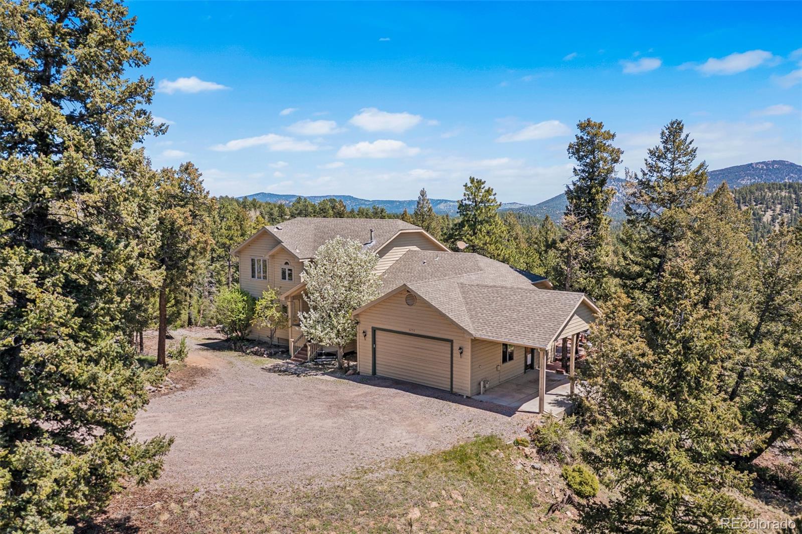 6252  King Drive, evergreen MLS: 8069417 Beds: 4 Baths: 4 Price: $1,250,000