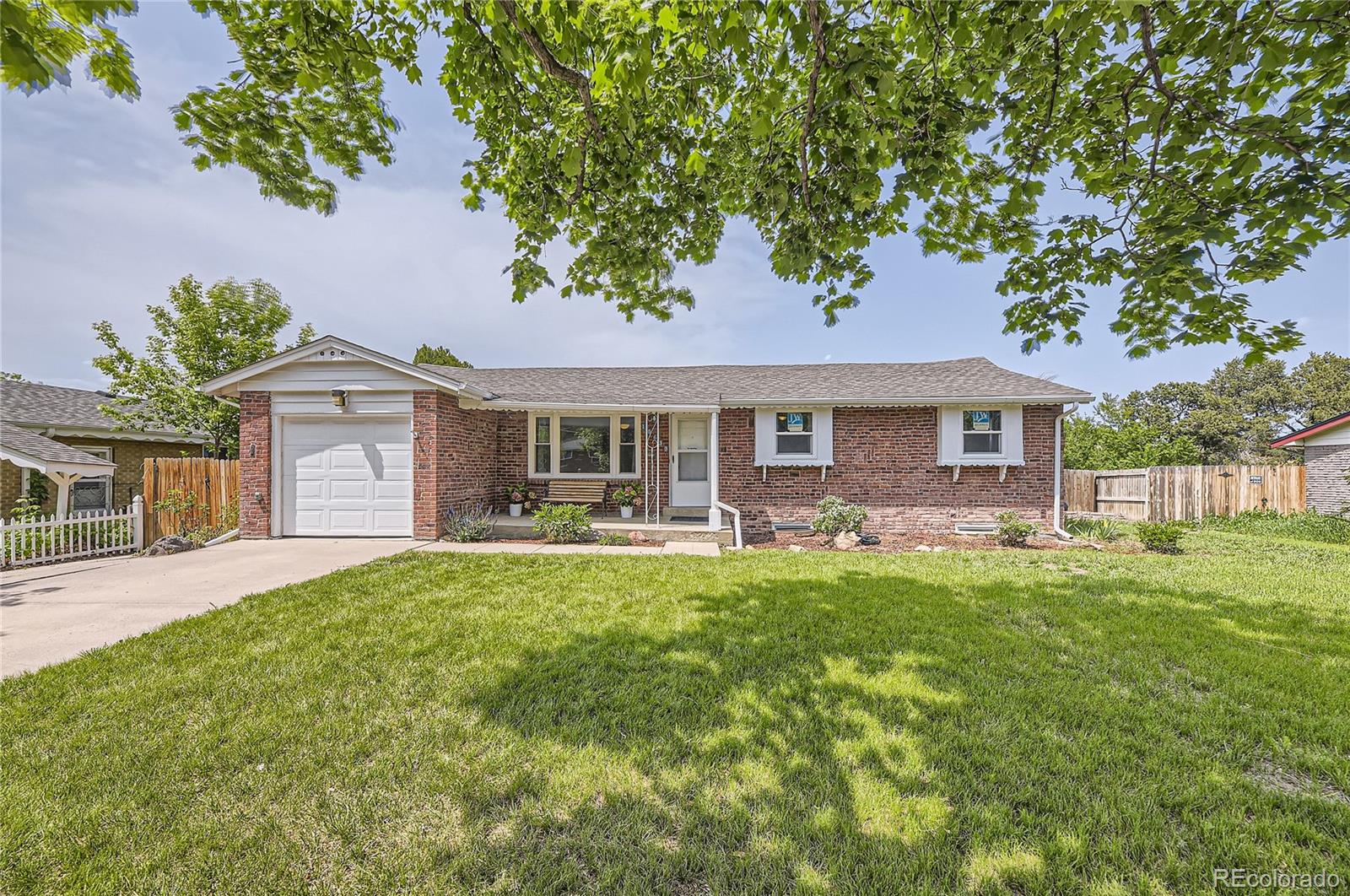10633 E 6th Place, aurora MLS: 3355981 Beds: 4 Baths: 3 Price: $540,000