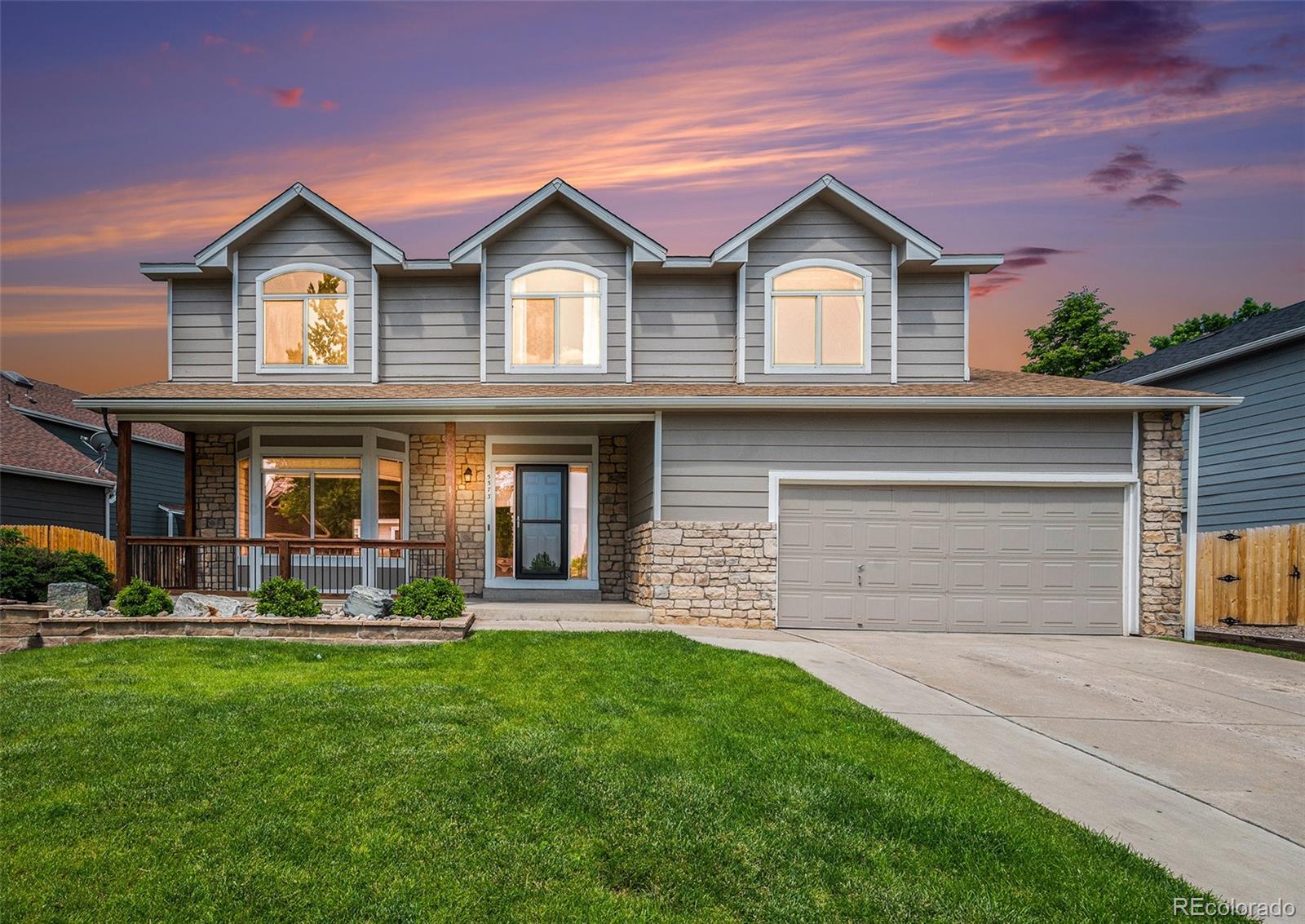 5573 S Taft Street, littleton MLS: 8034694 Beds: 4 Baths: 3 Price: $700,000