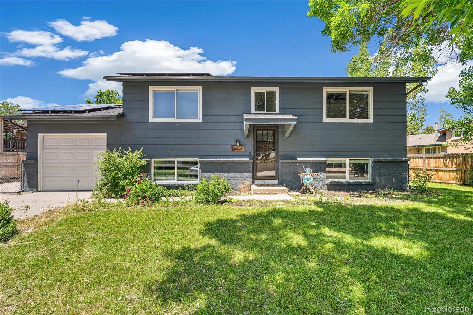 18355 W 59th Drive, golden MLS: 6073437 Beds: 4 Baths: 3 Price: $745,000