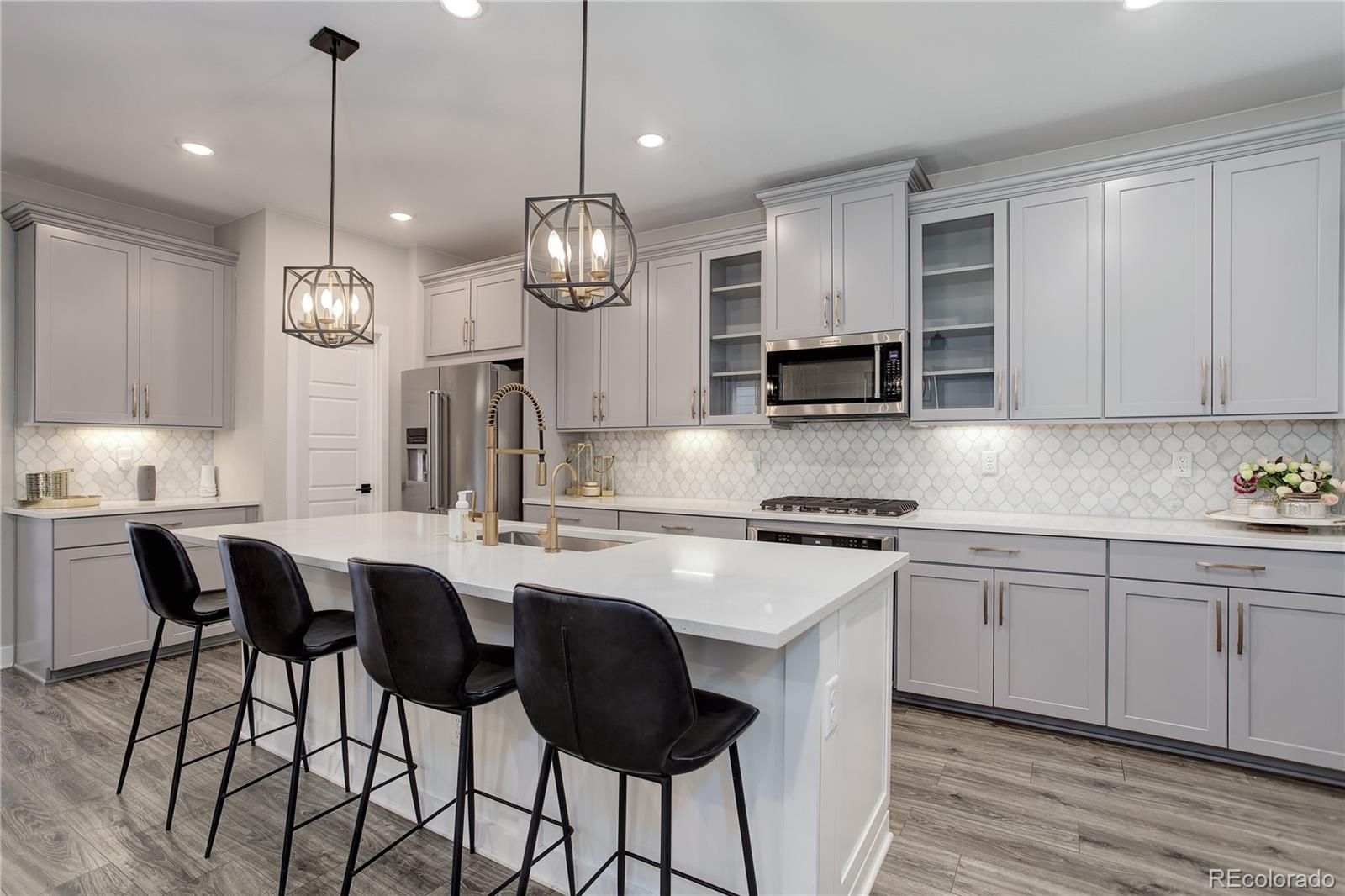 431  Courtfield Way, castle pines MLS: 5194153 Beds: 3 Baths: 3 Price: $649,000
